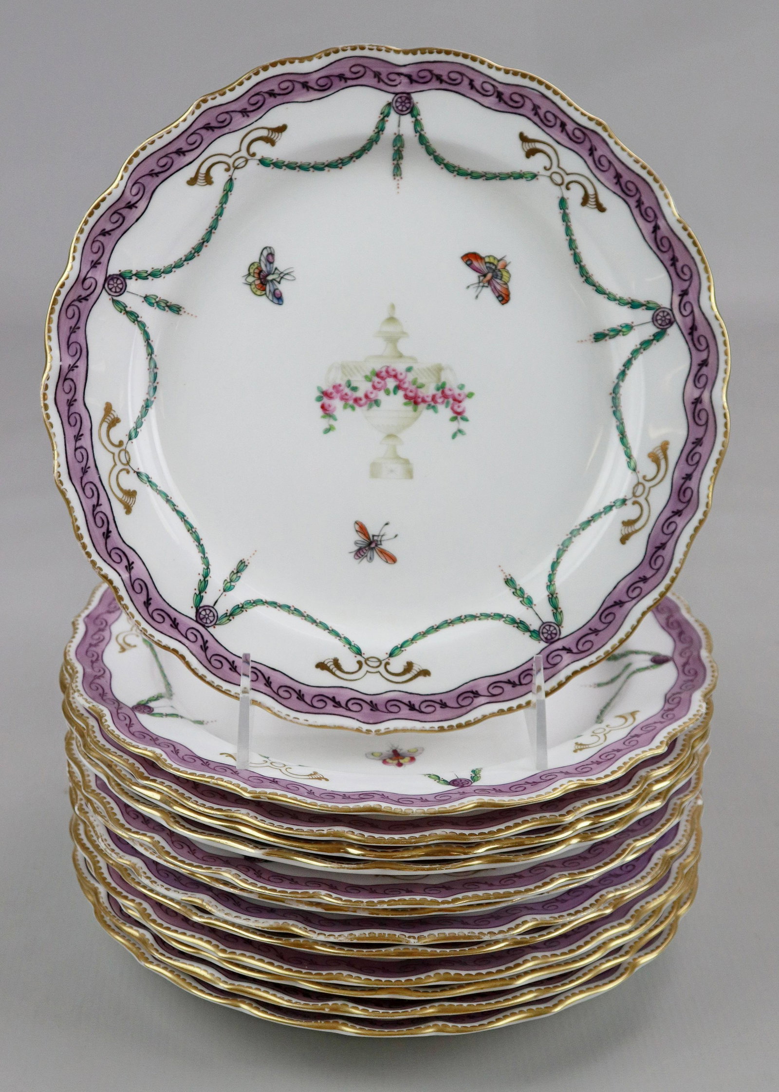 (13) 19th C. Royal Worcester Plates: (13) 19th c. Royal Worcester plates in painted urn, swag and butterfly decoration with scallop edge in purple and gilt trim, 8-3/4" diam