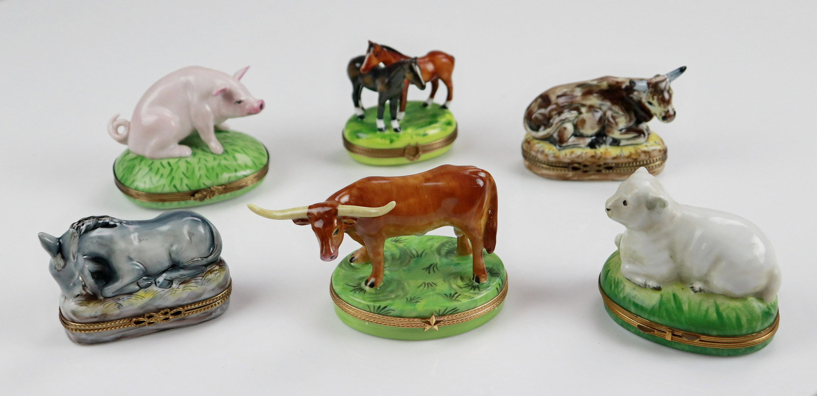 (6) Limoges Figural Farm Animal Trinket Boxes: (6) Limoges figural farm animal trinket boxes c/o joined horse covered box with horseshoe closure marked Peint a La Main Limoges France GV Chamart, 2-1/2"x3", donkey covered hay painted box marked Roc