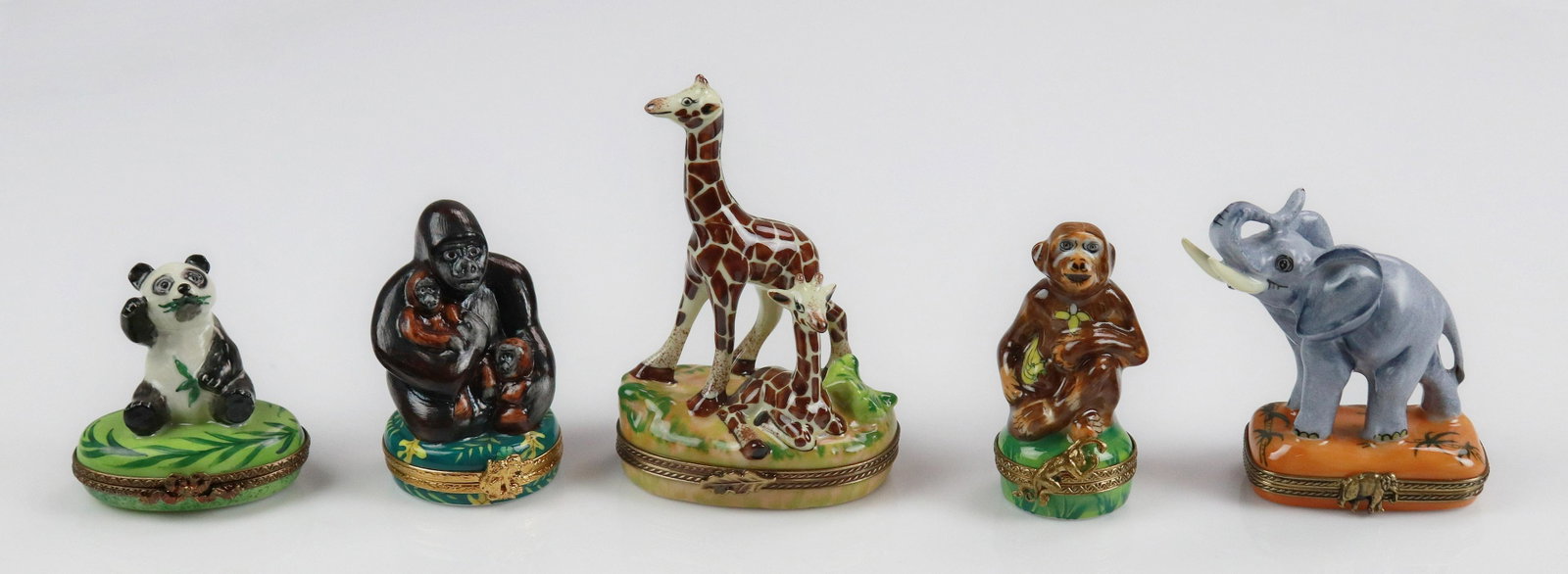 (5) Limoges Exotic Animal Trinket Boxes: (5) Limoges exotic animal trinket boxes c/o panda topped bamboo decorated box marked Limoges France Marque Deposse Peint Main, 2-1/4", trunk up elephant topped box marked Chamart Peint a la main Limog