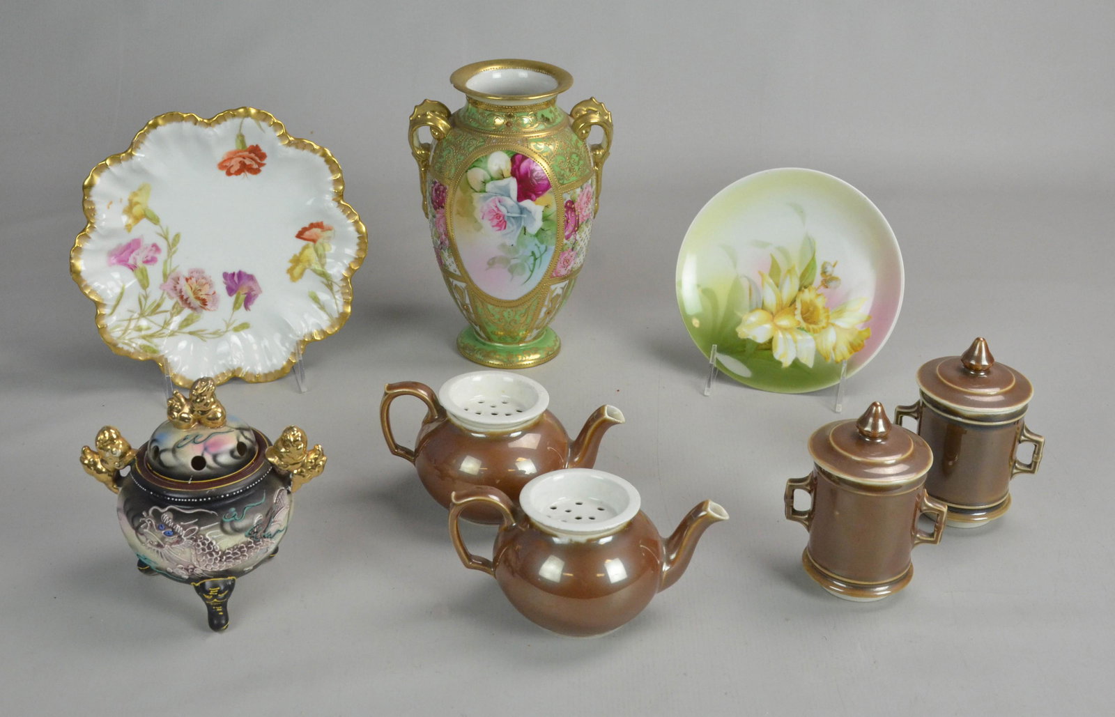 (6) Pcs Porcelain Vase, Teapot, Censer and Plates: (6) Pcs Porcelain vase, teapot, censer and plates to include gilt floral Nippon moriage double handled vase, 8-1/2" h with chip at neck, (2) French Vierzon teapots with lidded strainer, moriage censer