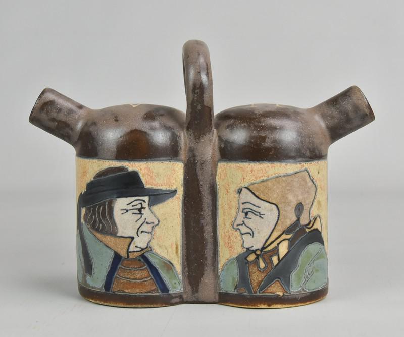 HB Quimper Odetta Portrait Vinaigrette: HB Quimper pottery Odetta gres ware portrait vinaigrette, connected double cylinders with H & V on top, single loop handle, one side with a profile portraits of a Breton and Bretonne, stylized sunburs