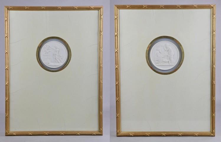 (2) English Intaglio Plaster Cameos: (2) English Intaglio plaster cast cameo plaques, c/o kissing couple with putti, old man & woman with cat, each plaque 5-1/4" dia, gilt framed 25-1/4" x 19-1/4", some cracks in gesso mat
