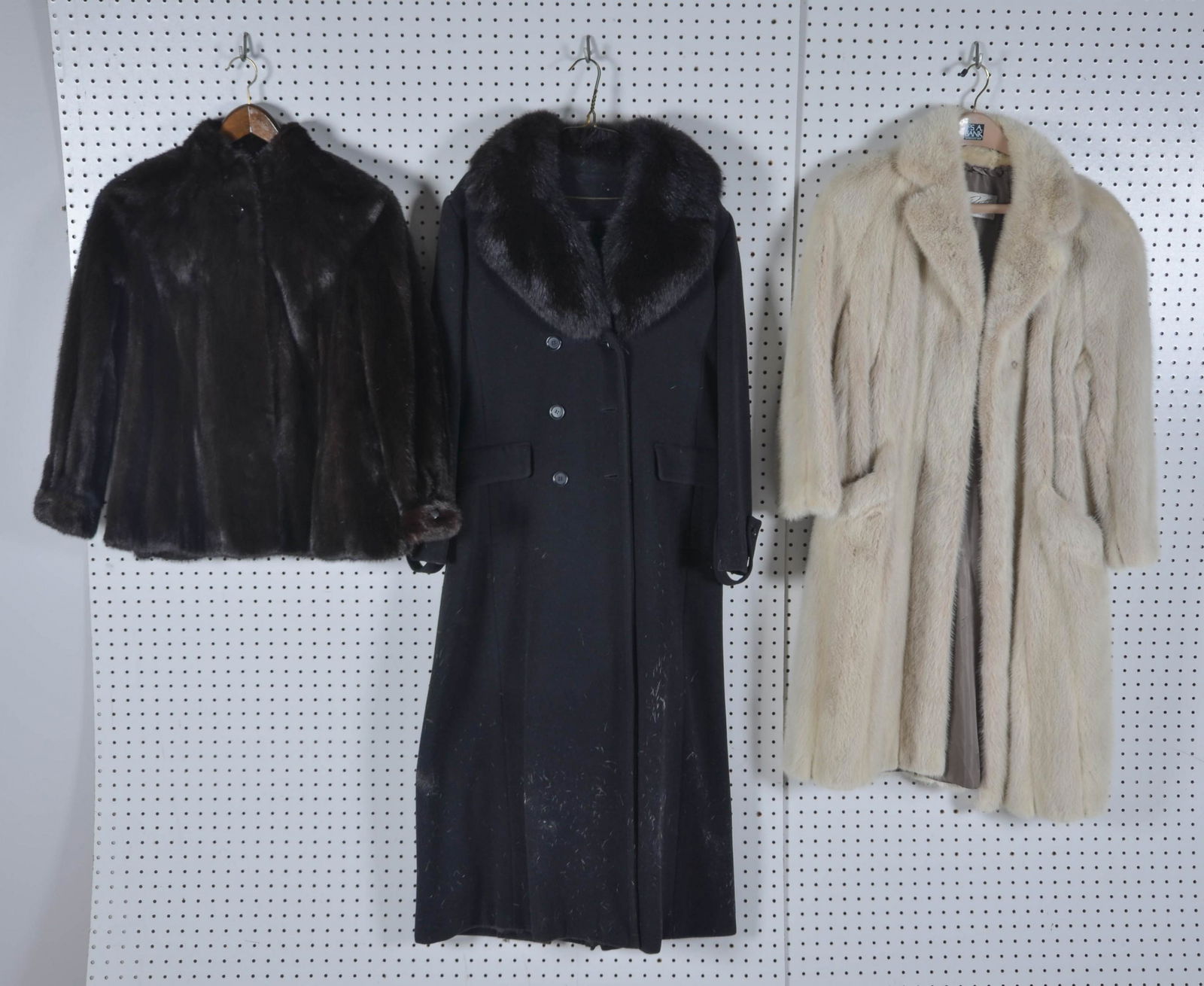 (3) Mink, Fox and Wool Coats: (3) Mink, fox and wool coats c/o (2) Patchin fur coats in cream and brown, cropped and calf length, and wool cashmere blend double breasted coat with fox fur collar, each with 40" bust in good conditi