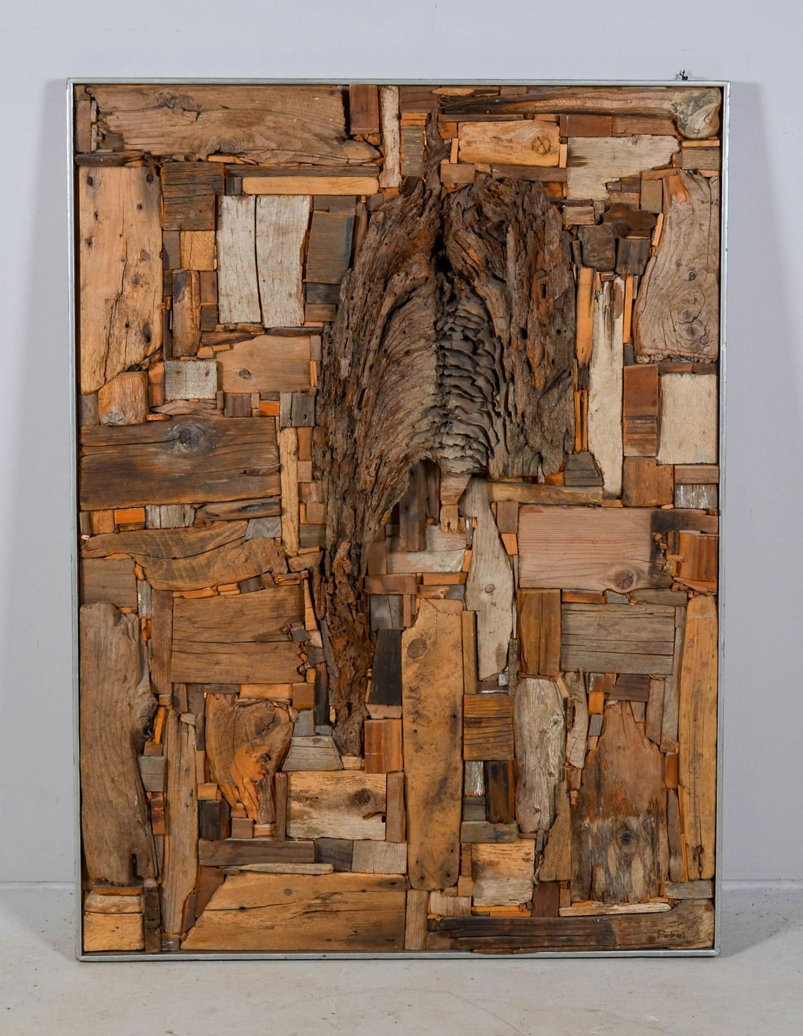 Henry Petzel Wood Collage: Henry Petzel (American, 1920-2016) wood collage, assemblage of natural and milled wood on plywood, signed "Henry Petzel" on back, 48-3/4" x 35-3/4", good condition