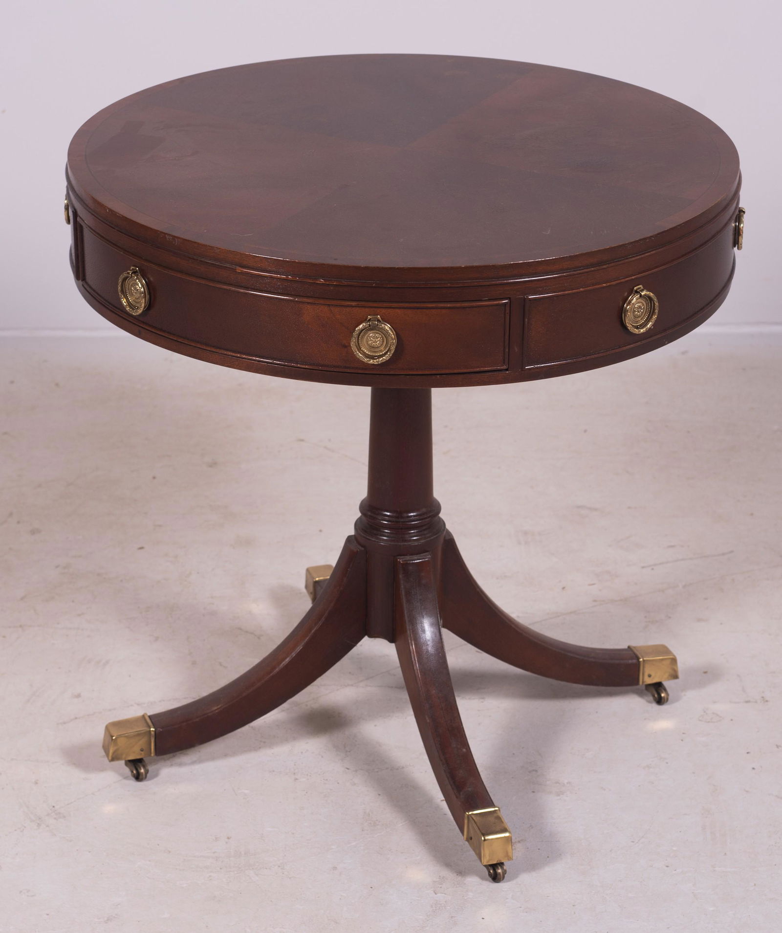 Baker Mahogany drum table: Baker Mahogany drum table, two drawers, 26" h x 26" diameter, watermarks on top