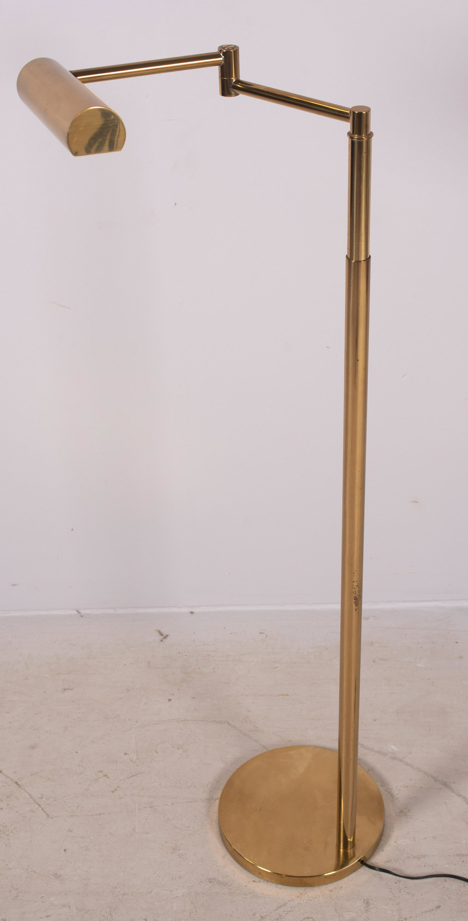 Brass Koch & Lowy Omi Floor Lamp: Brass Koch & Lowy Omi floor lamp with adjustable neck and light, 50-1/2" h, fully extended.