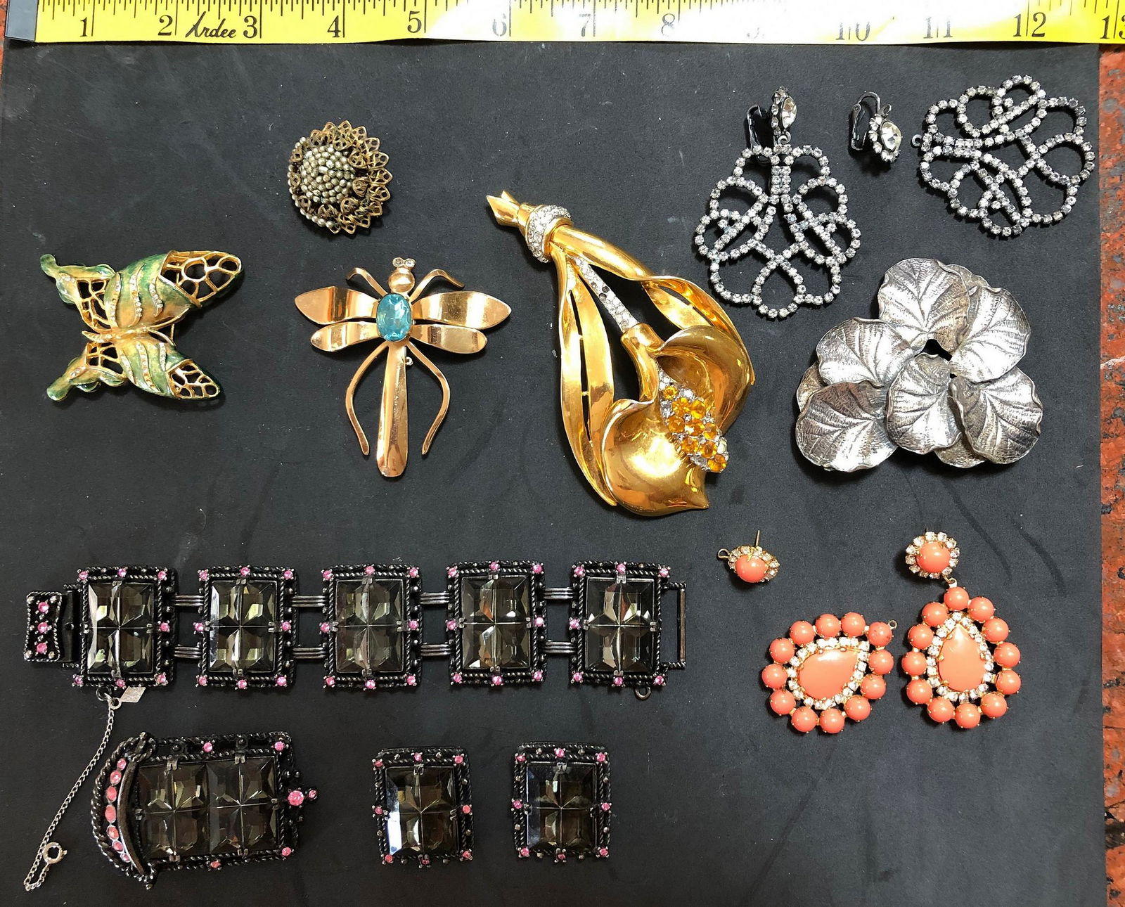 10 Pcs Signed Costume Jewelry: 10 Pcs Signed Costume Jewelry; Coro callolily pin, Corot dragonfly, Haskell round beaded pin, Carnegie butterfly pin, Schiaparelli leaf pin, Sarah Coventry 3 pc set, pr KJL rhinestone earrings, pr KJL