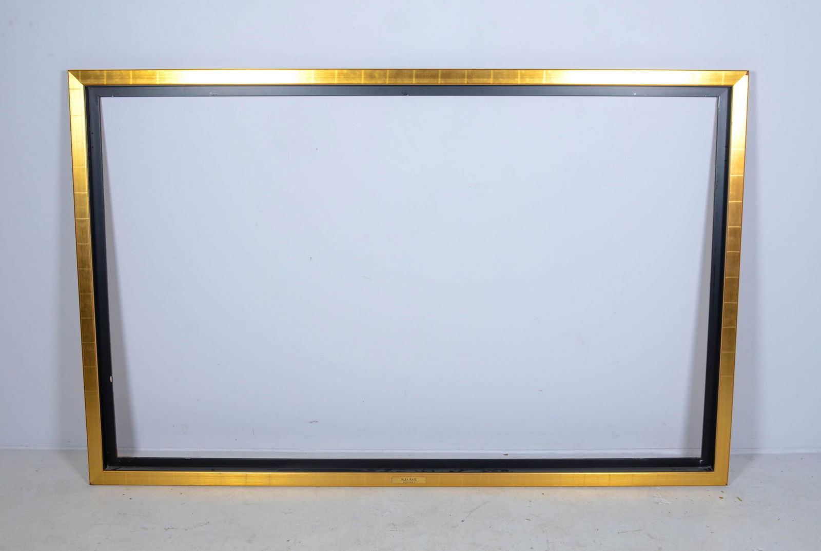Large Contemporary Frame for Painting: Large contemporary frame for painting, gold leaf with ebonized lining, inside measurements 79-1/4" x 49-1/4", floater frame designed for 78" x 48" painting, previously framed a painting by Alex Katz,