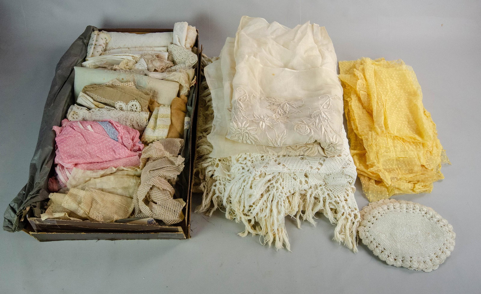 Lace, Crochet and Salvage Lot: Lace, crochet and salvage lot to include large portion floral embroidered fabric, beaded and crochet doilies, embroidery portions, lace portions, swiss dot portions, (2) oversized crochet bed covers a