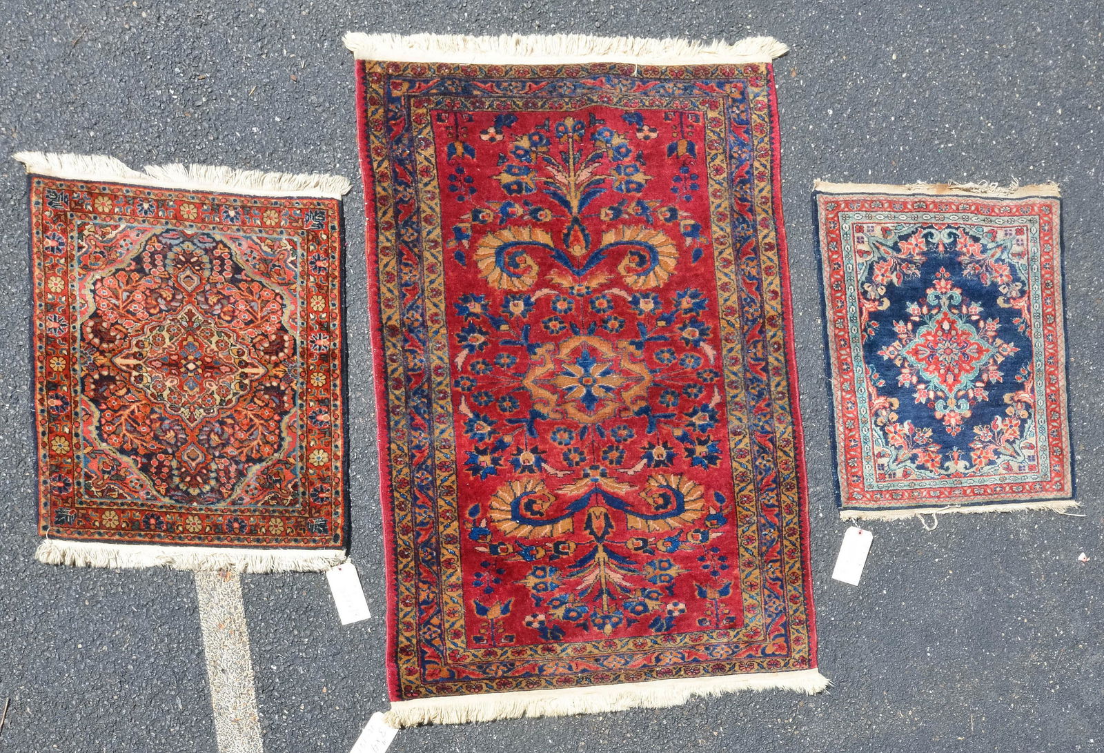 (3) Antique Persian Rugs: (3) Rugs: 3' x 4'10", 2'3" x 2'1", 2'4" x 2'8" Antique Persian rugs, moth damage