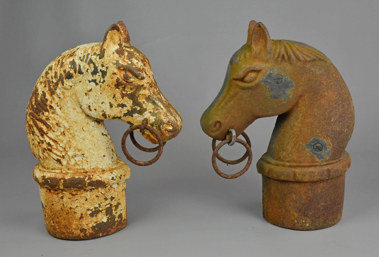 Figural Cast Iron Hitching Post Toppers: Figural cast iron hitching post toppers, horse head form, ring loops at mouth, (1) in chipping white paint, 12-1/2" h