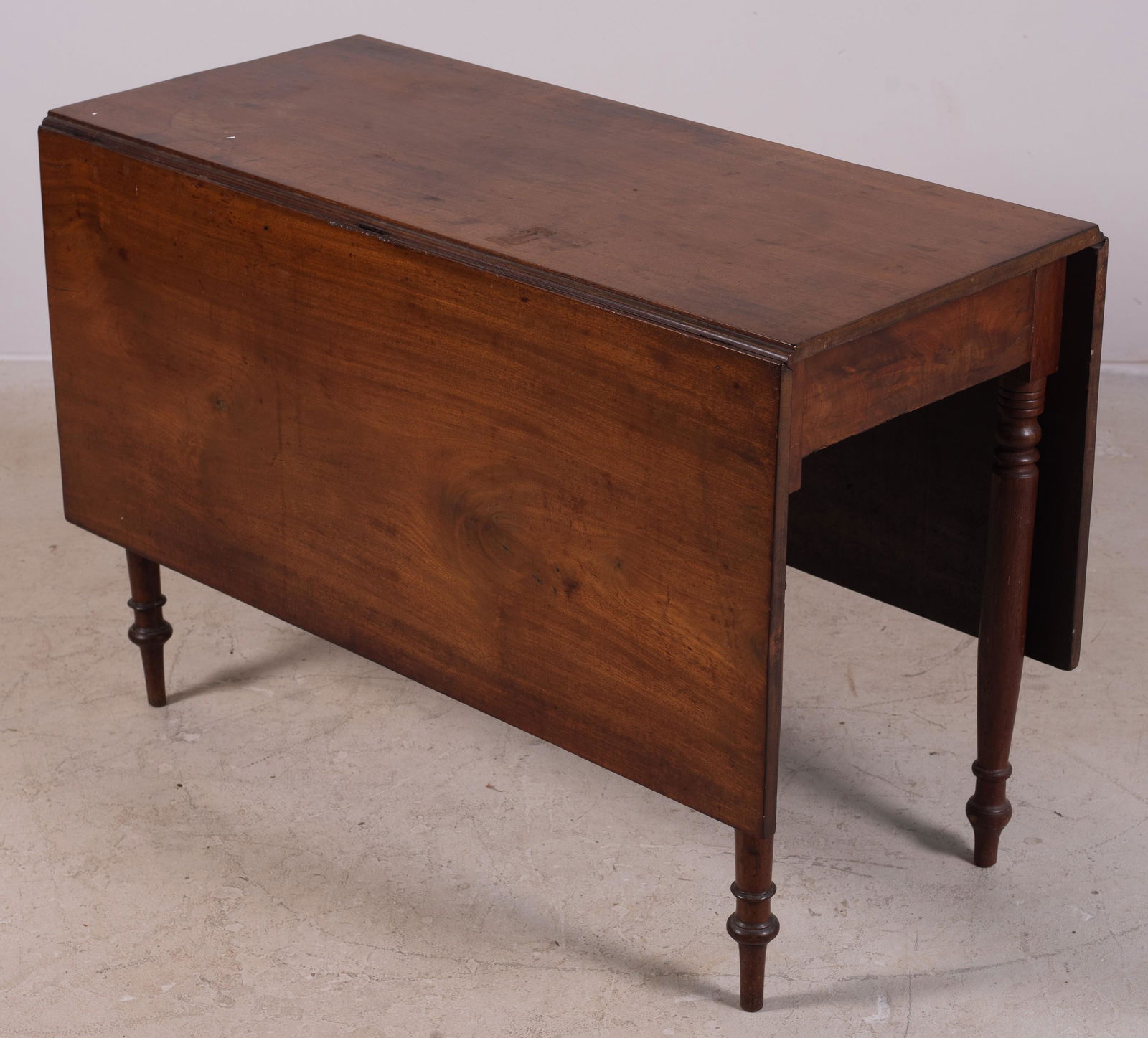 Mahogany Sheraton Drop Leaf Table: Mahogany Sheraton drop leaf table, mid-19th C, 43" l x 18" w x 19-1/2" leaves