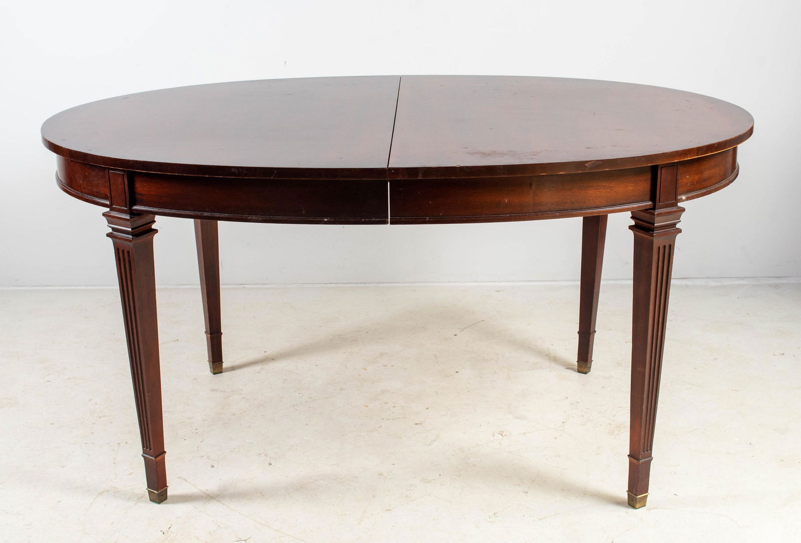 Oval Mahogany Directoire Style DR Table: Oval mahogany Directoire style dining room table with (3) 12" leaves, 60" L x 42" W