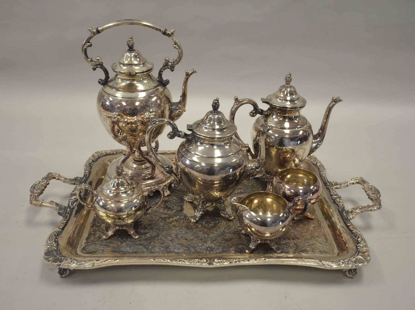 6-Pc Wm Rogers SP Tea Set & Tray: 6-Pc Wm Rogers silver plate tea set, c/o tilting tea kettle, teapot, coffee pot, sugar, creamer, waste bowl, on unmarked double handled tray