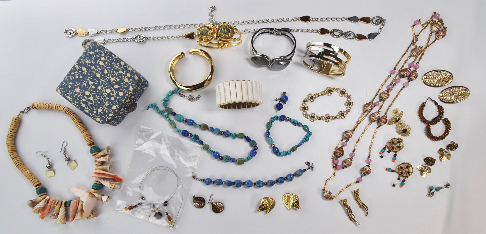 Fashion Costume Jewelry: Lot of fashion costume jewelry C/O; (1) cloth jewelry box, (4) bangle bracelets, (1) stretch bracelet (1) artisan made shell necklace, (1) 56" Pink glass beaded necklace, (1) Glass wire necklace, (11)