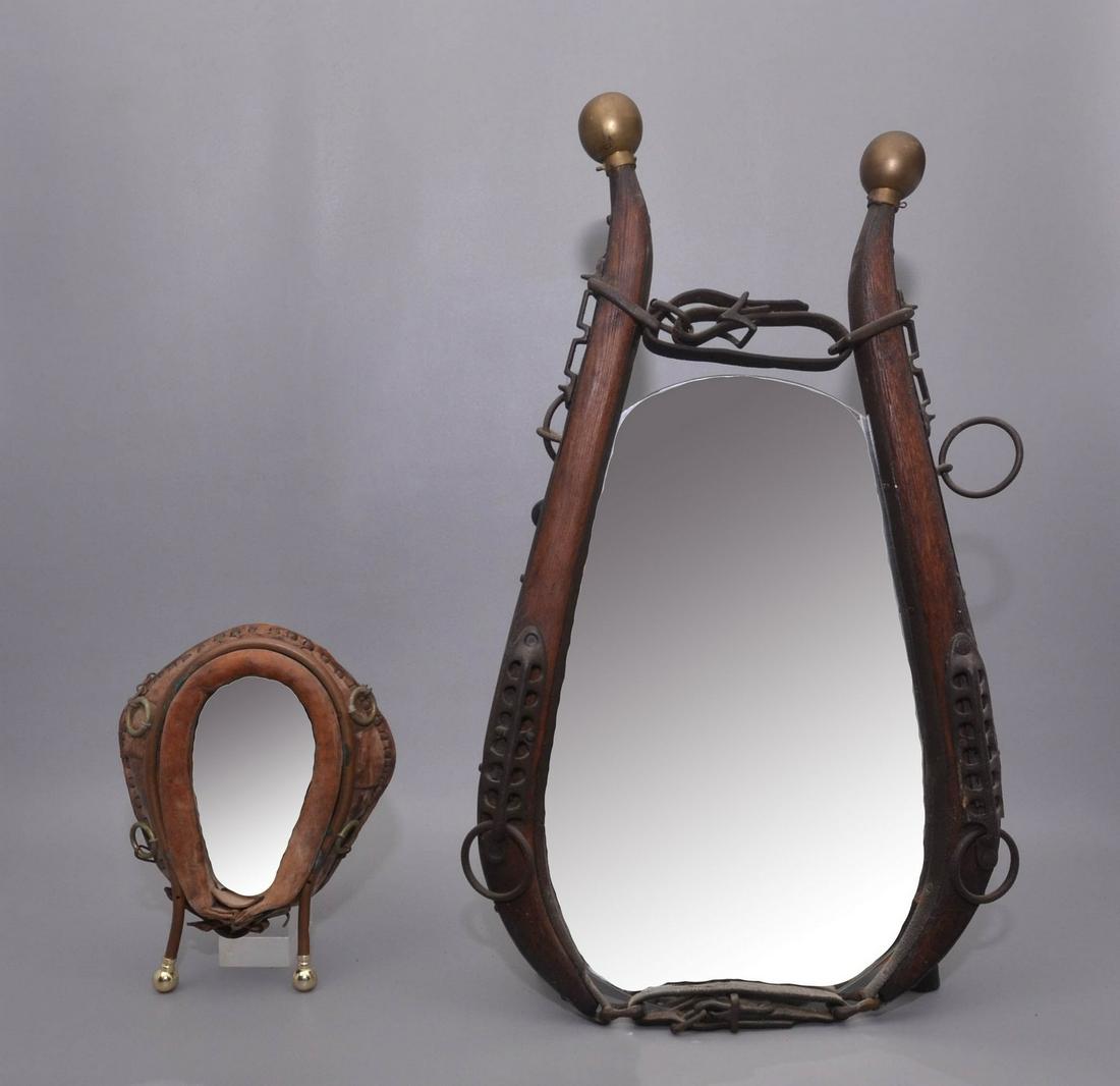 (2) Horse Collar Wall Mirrors: (2) Horse collar wall mirrors c/o 27" antique collar with later mirror center and diminutive leather collar with later mirrored center, 12"
