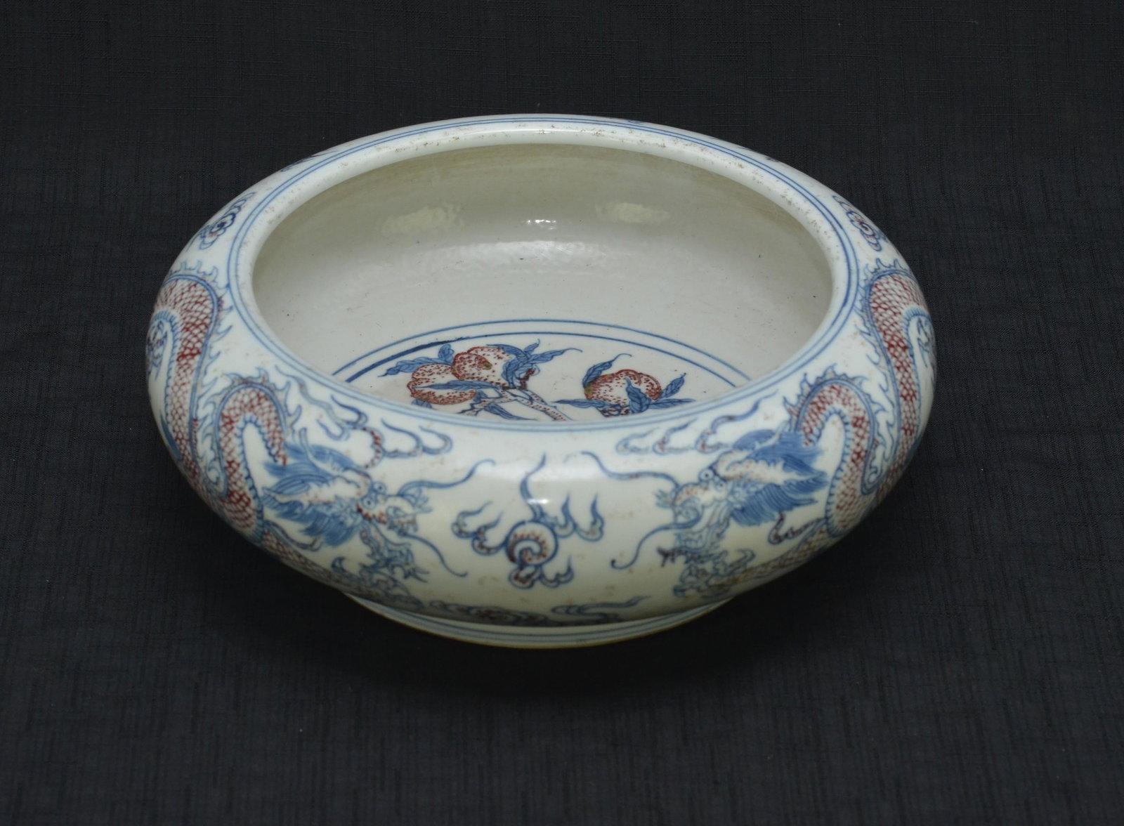Chinese Porcelain Red & Blue Bowl: Chinese porcelain underglaze copper red and blue bowl, dragon decoration, 6 character mark to base, 10Ã¯Â¿½ dia x 4Ã¯Â¿½ h