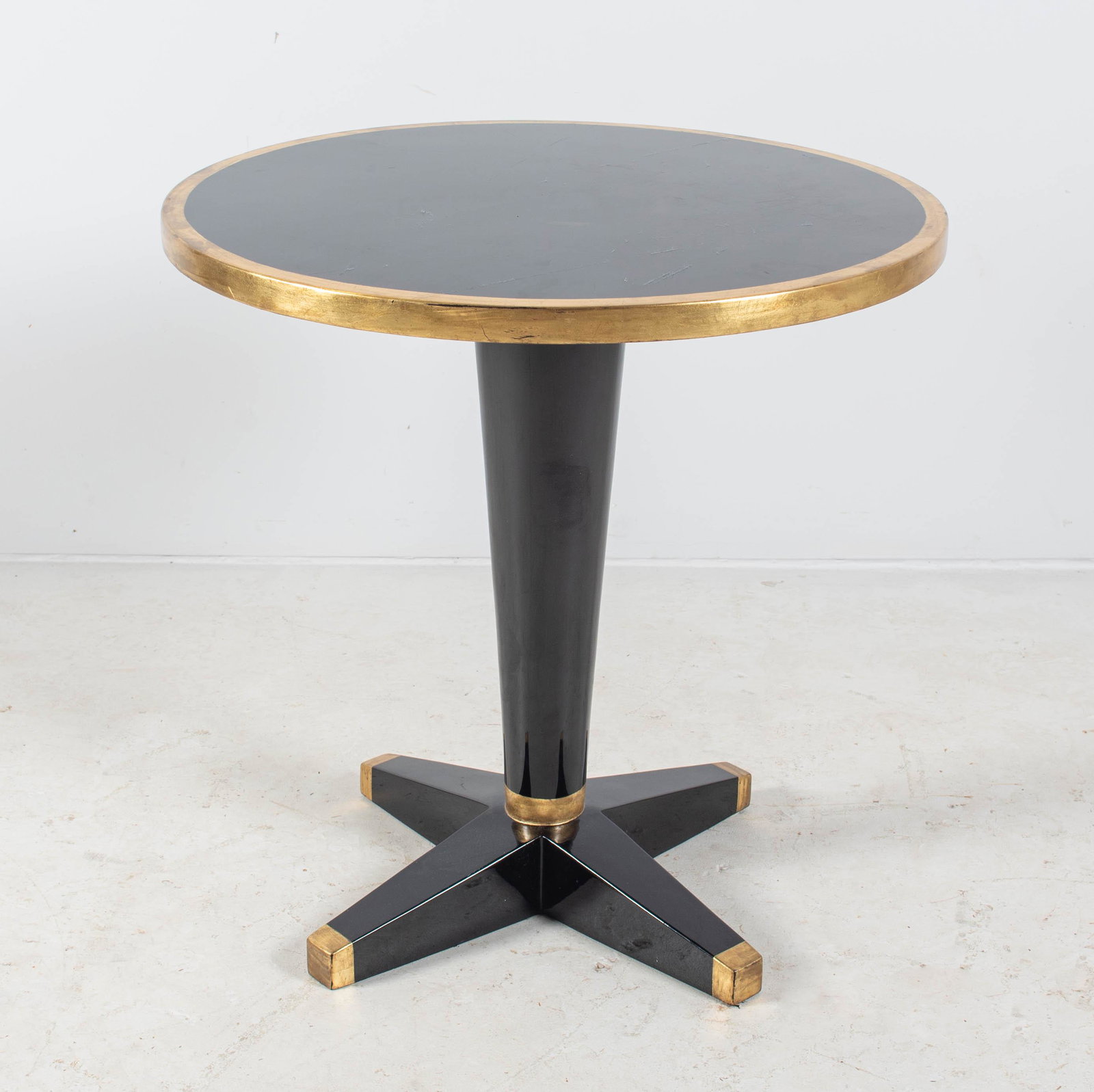 Black and gilt lacquer modern design round center table: Black and gilt lacquer modern design round center table, 30" diameter, 28" high, some scratches to top