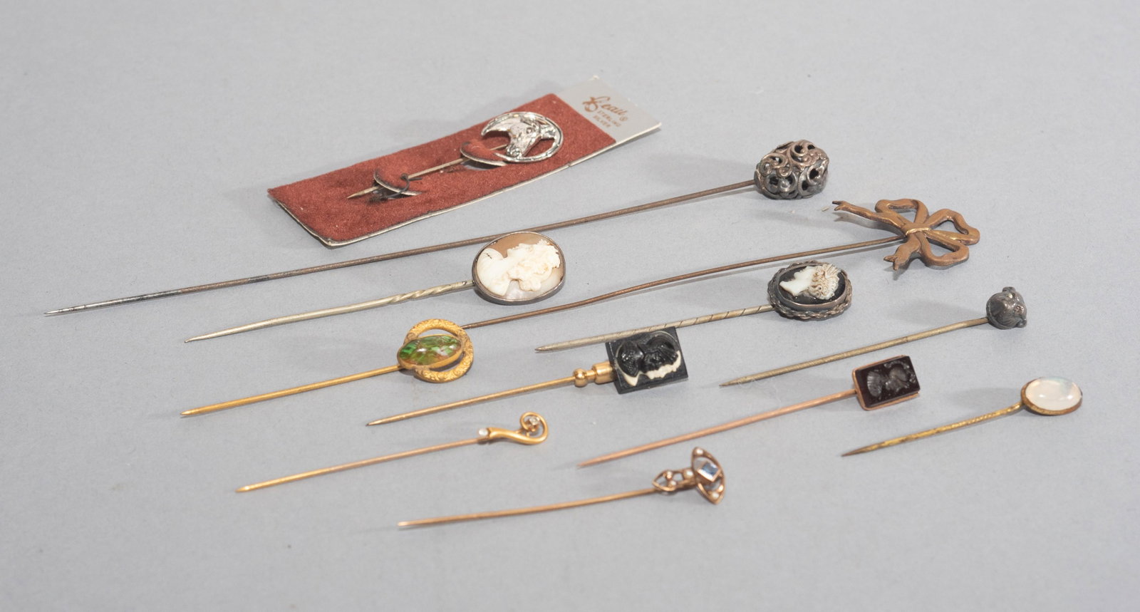 (12) Stick Pins, 3 test 14K, 4 cameo/intaglio, mo: (12) Stick Pins, 3 test 14K, 4 cameo/intaglio, most others with stones, 1 sterling horse head