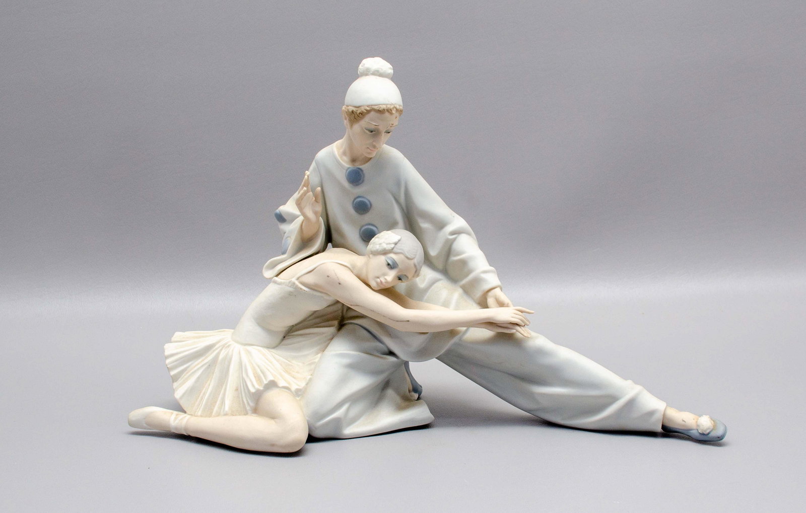 Lladro Closing Scene Figure: Lladro porcelain figurine, "Closing Scene" featuring harlequin clown with ballerina, matte finish, 9-1/4" h x 14-3/4" w