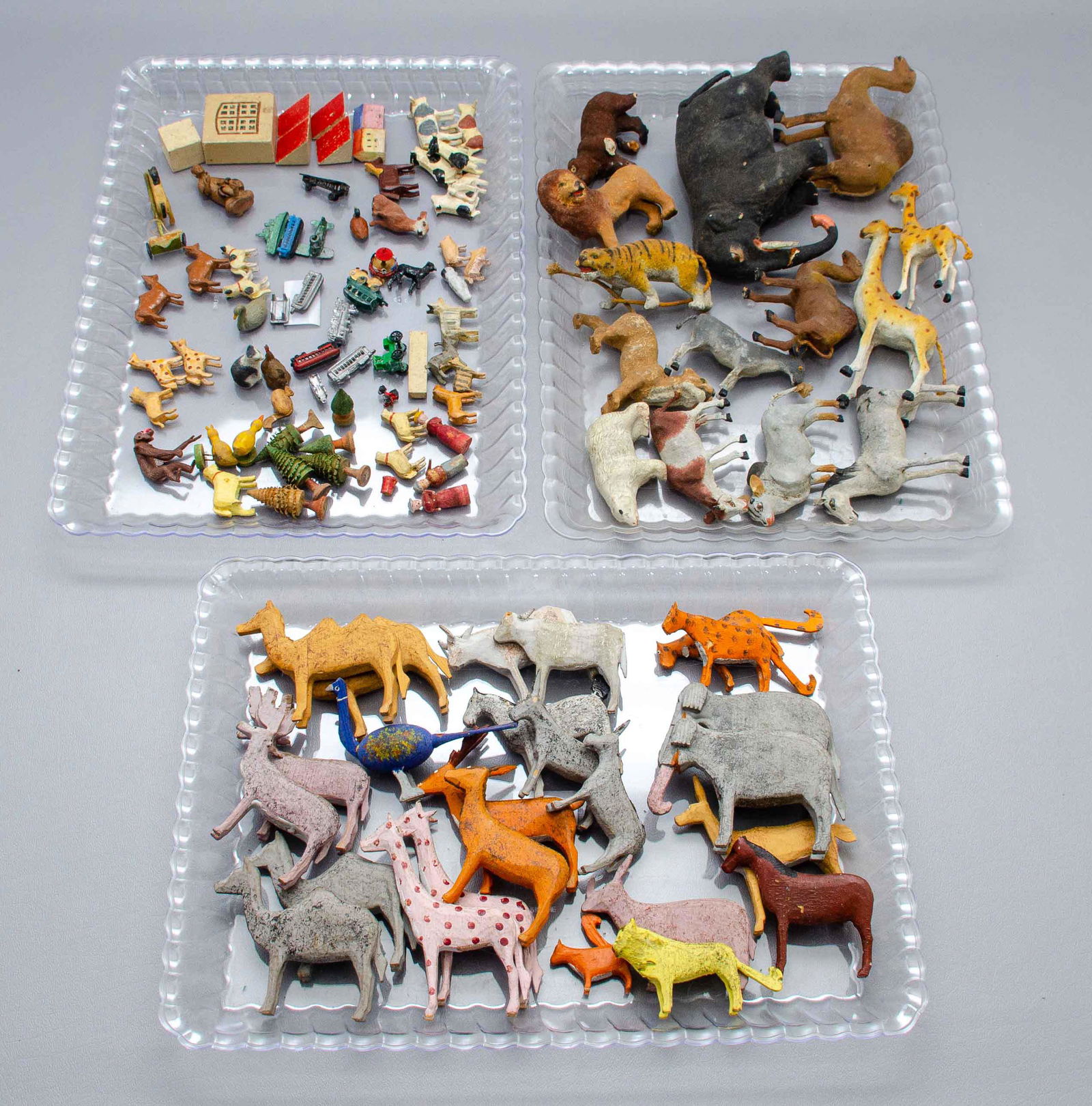 Composition, Wood, Metal and Papier Mache Animals: Composition, wood, metal and papier mache animals to include wood comprised hand painted ark animal pairs, papier mache and composition jungle animals in flocked exterior and miniature painted wooden