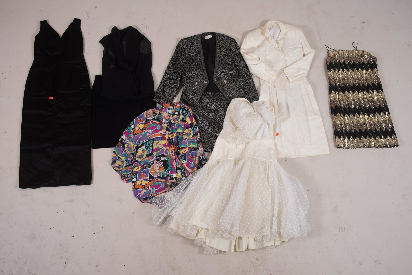 (6) Pc 80's Garment Grouping: (6) Pc 80's garment grouping to include Michael Seroy allover printed weightlifting themed shirt, retailed by Mooshka Philadelphia (1980's-90's), Lee Jordan New York black satin zip front column dress