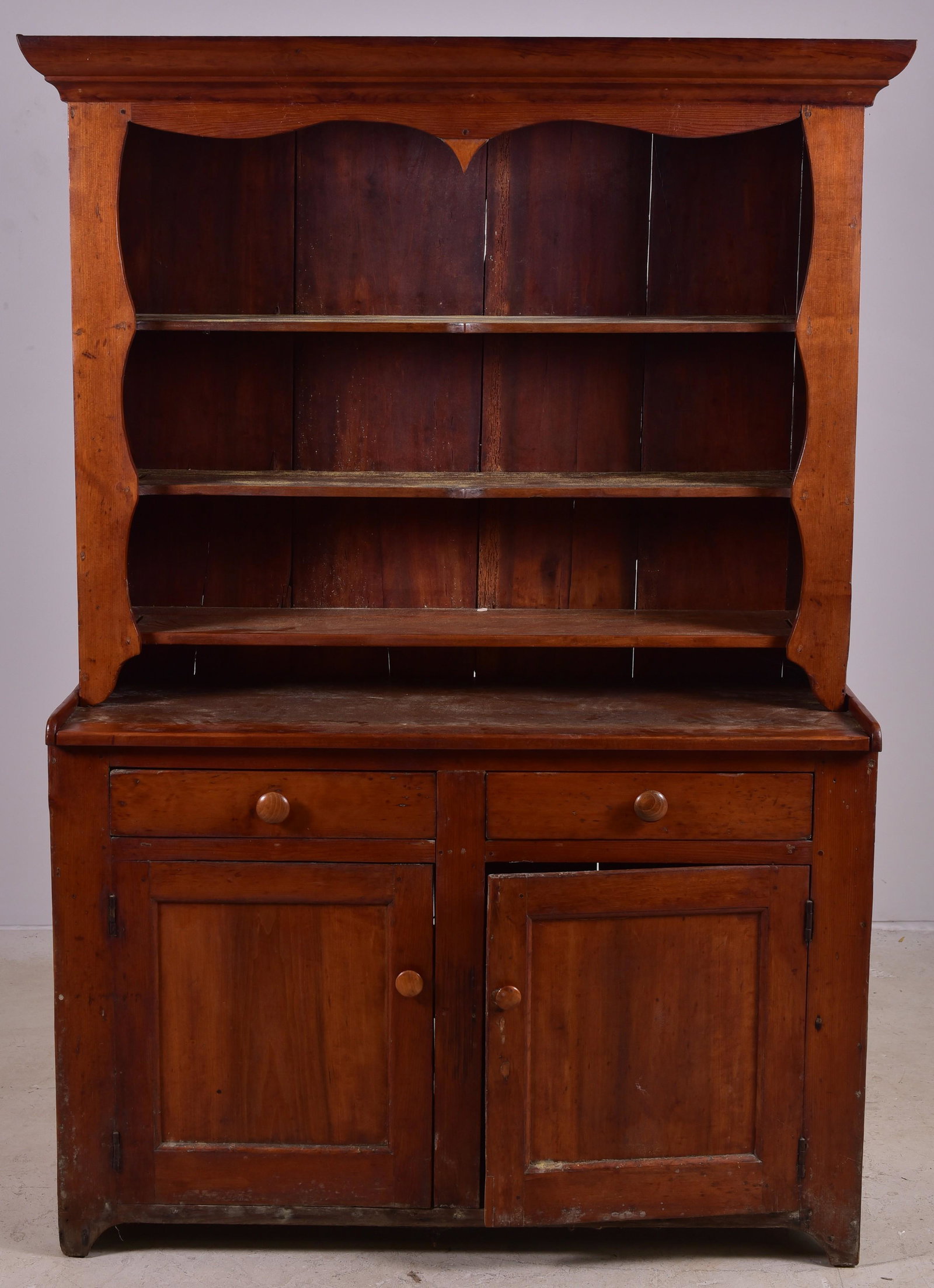 2 Pc Softwood Wall Cupboard: 2 Pc Softwood Wall Cupboard, the top with three open shelves with plate grooves, over a base with two drawers over two doors, on a cutout bracket base, mid-19th century, 52 inches wide, 78 inches high