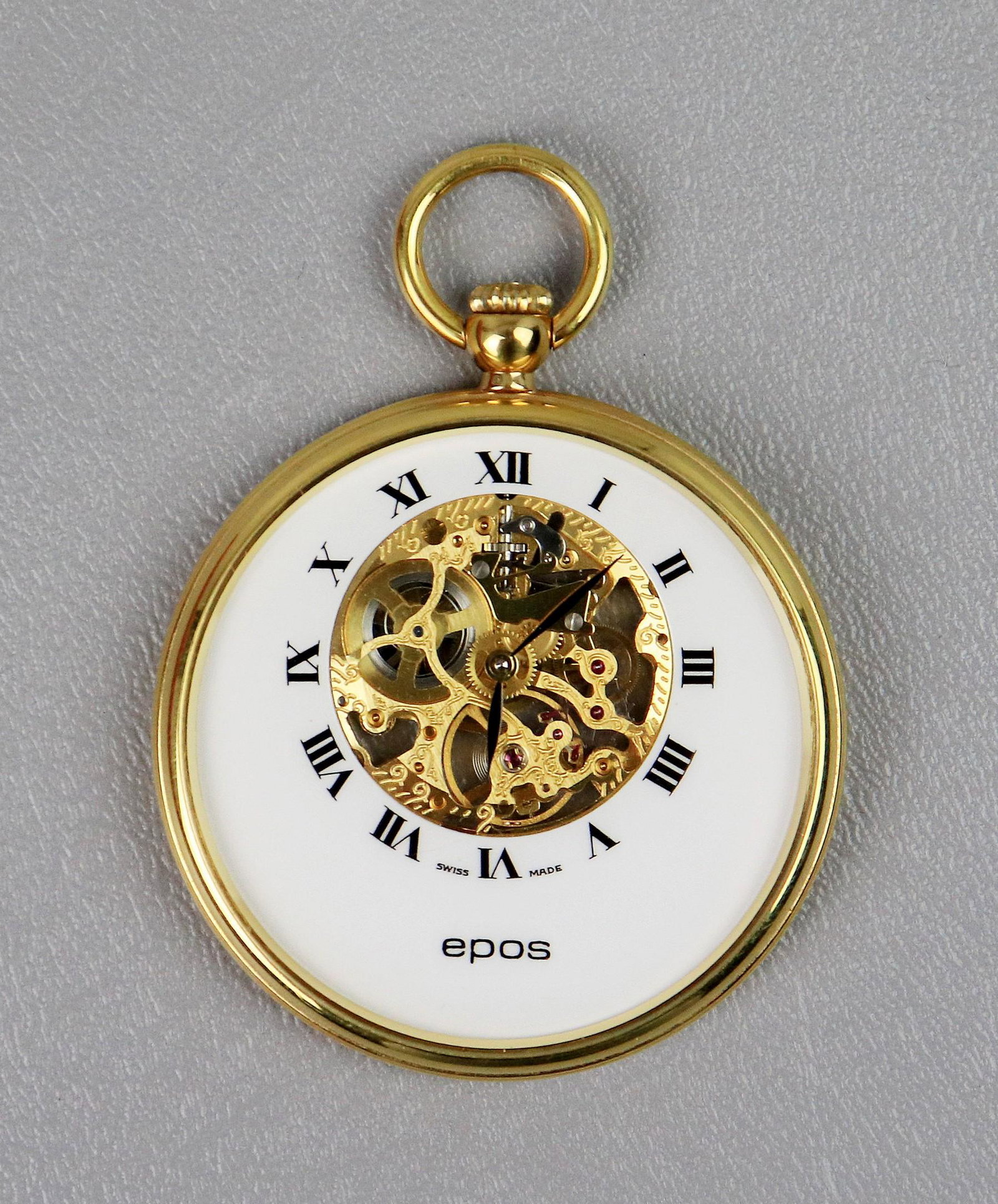 Epos Open Face Pocket Watch, skeleton view of mov: Epos Open Face Pocket Watch, skeleton view of movement front and back, gold tone 48 mm diameter case, runs when wound