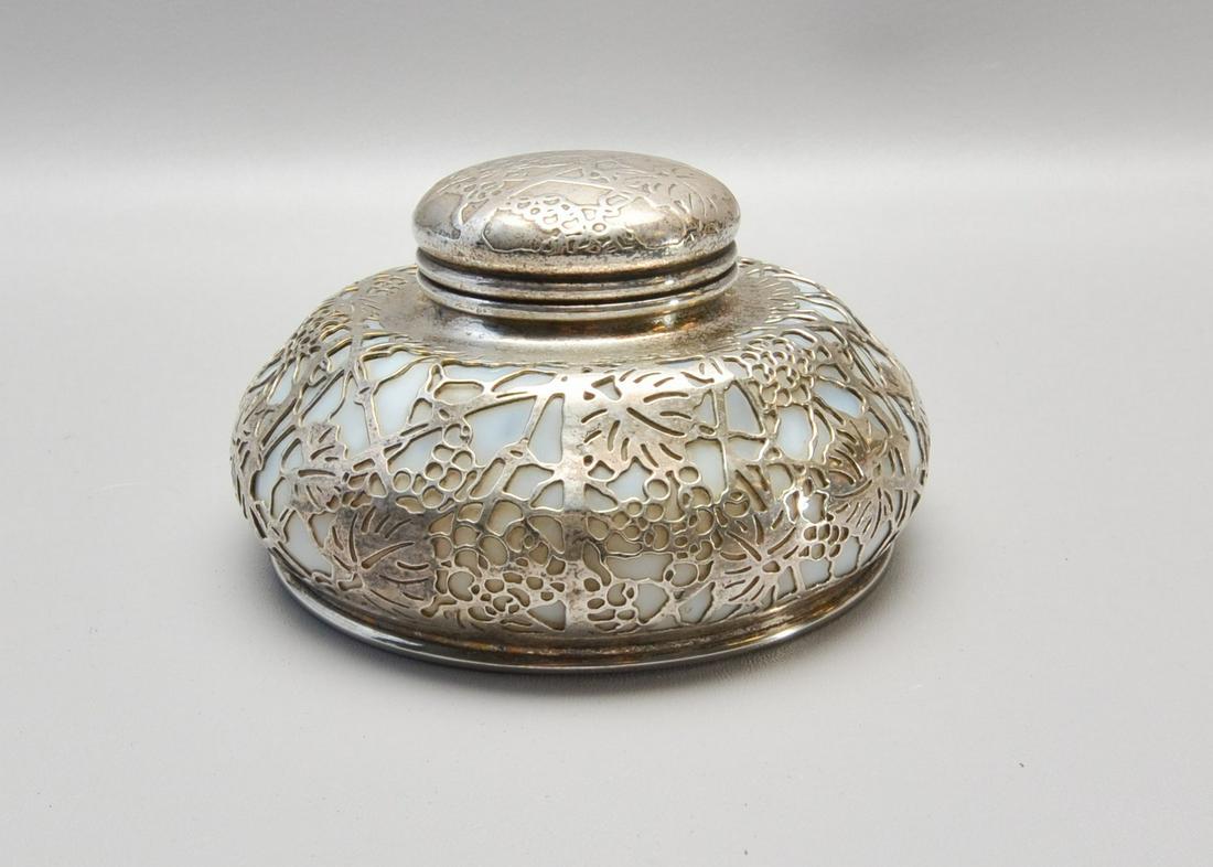 Tiffany Studios Sterling Overlay Grapevine Patter: Tiffany Studios Sterling Overlay Grapevine Pattern Inkwell, 7" d, 3 1/2" h, insert signed Davis, 3" x 1/2"interior fracture in glass at lower edge of glass,