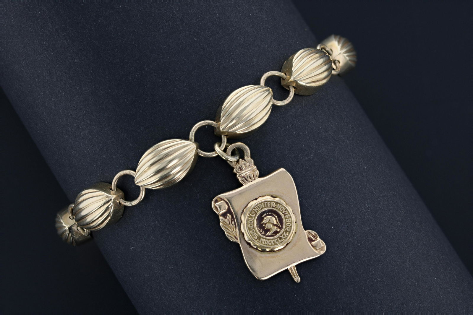 14K YG Charm Bracelet, 7.0 dwt, w/a 10K YG charm,: 14K YG Charm Bracelet, 7.0 dwt, w/a 10K YG charm, 2.7 dwt