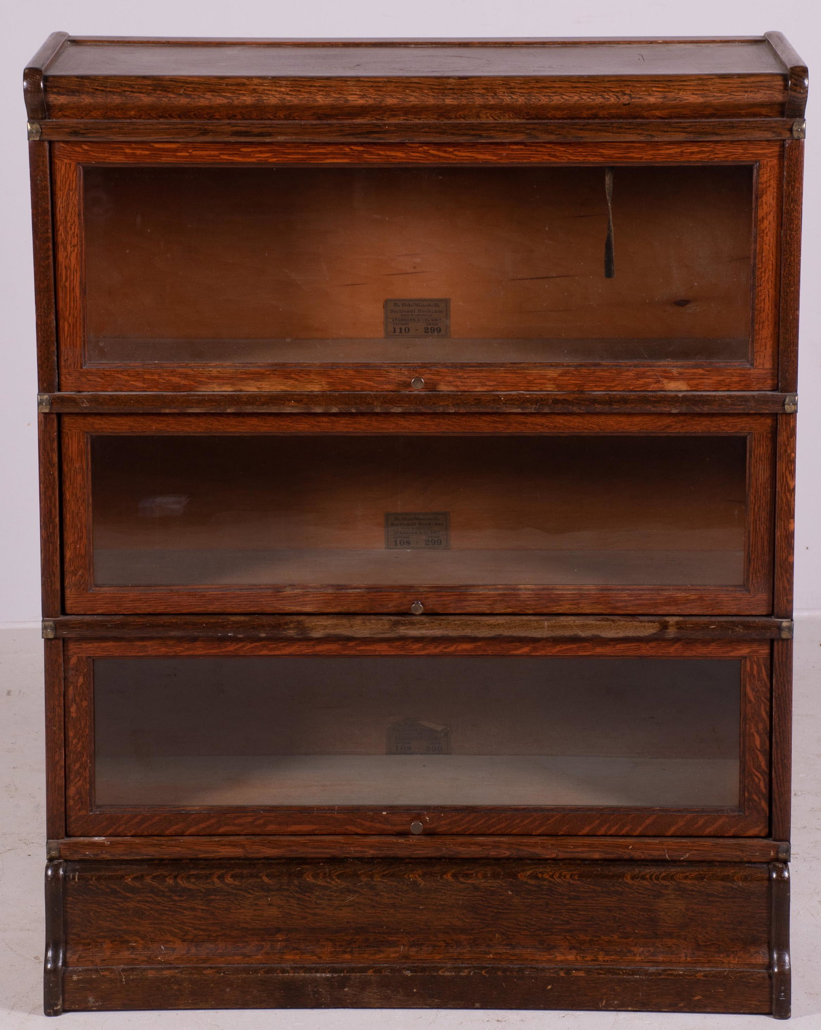 Oak Globe Wernicke Co barrister bookcase: Oak Globe Wernicke Co barrister bookcase, three stack, pattern 110, grade 299, 44" h x 34-1/4" w, some wear and scratches
