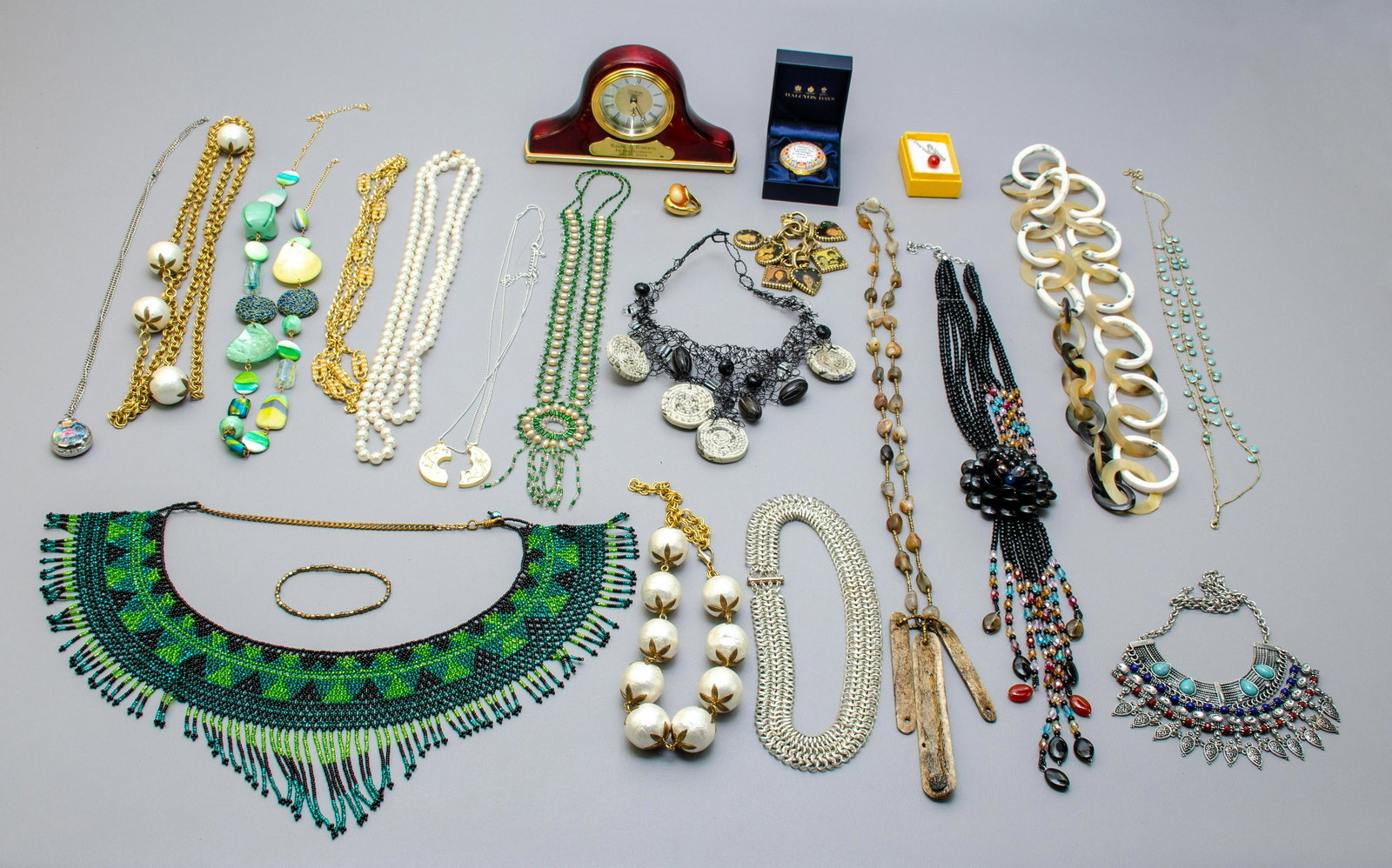 Large Lot of Fashion Jewelry: Large Lot of Fashion Jewelry, (18) Necklaces, one black beaded signed Joan Rivers, (1) silver tone boxed single bead necklace (2) Bracelets, (1) Fashion ring signed KJL, (2) fashion rings, unsigned Sz