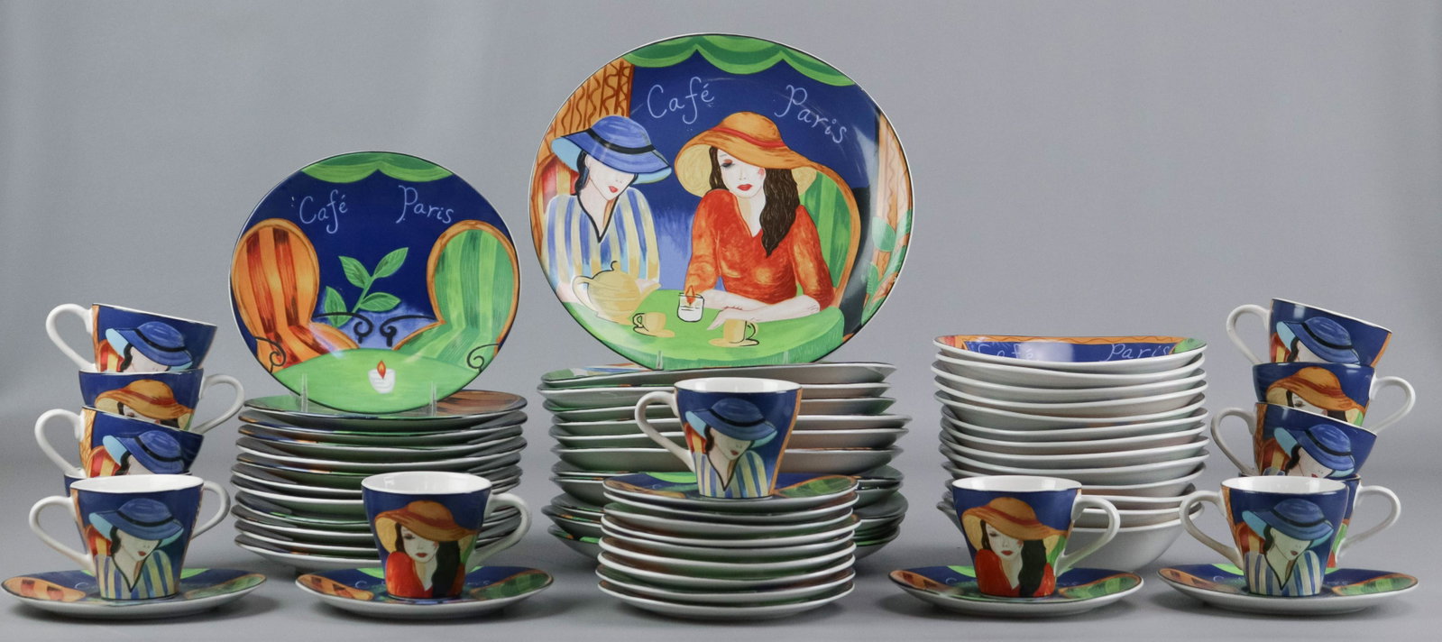 (65) Pcs Sango 'Cafe Paris' Dinnerware: (65) Pcs Sango 'Cafe Paris' dinnerware to include (12) dinner plates, (12) salad plates, (13) soup bowls, (13) teacups and (13) saucers, (1) dinner plate with chip.