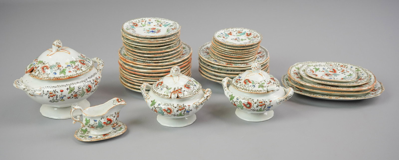 (44) Pcs Miniature Dinnerware: (44) Pcs miniature porcelain childs dinnerware, floral with Asian vase & butterfly pattern, including tureens, trays, plates, gravy boat with under tray, largest tureen 4" h x 5" w
