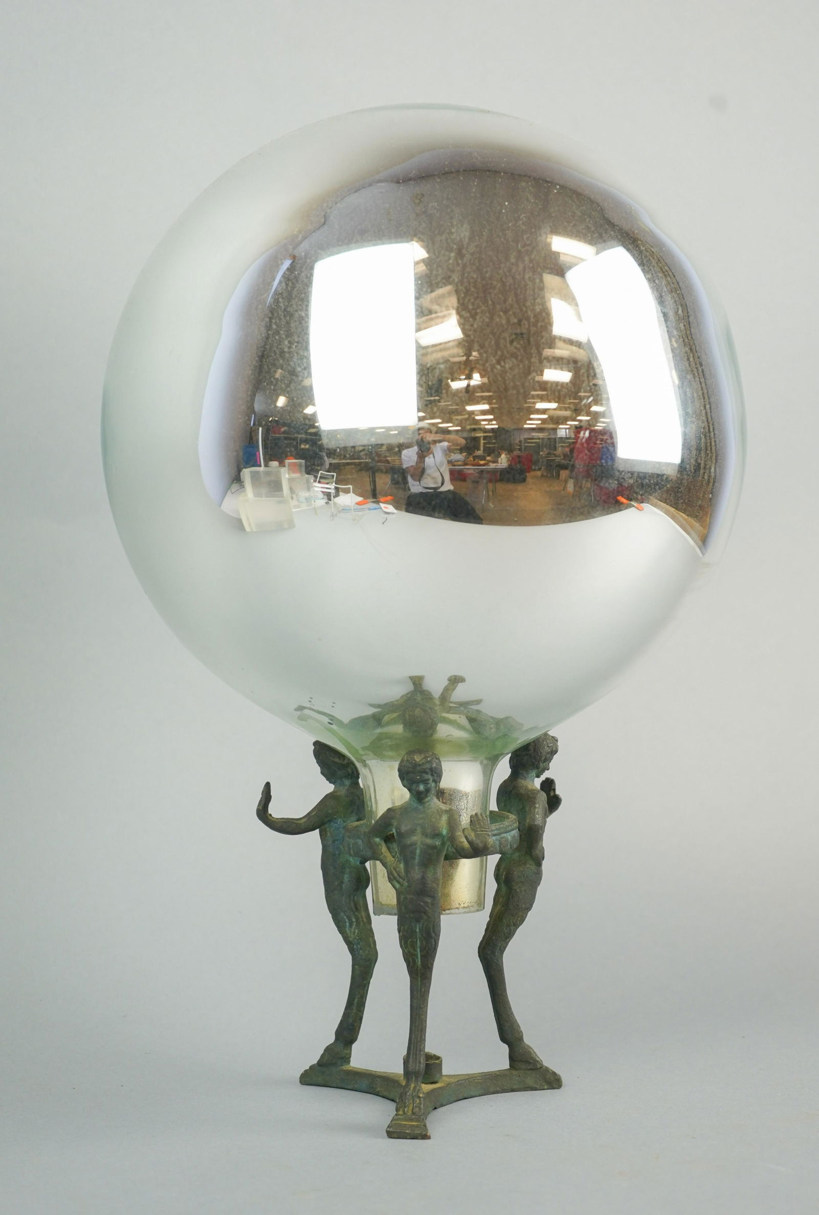 Mercury Glass Gazing Ball on Stand: Mercury glass gazing ball with stem, 9" dia, on cast metal figural tripod stand, 15-1/2" h overall