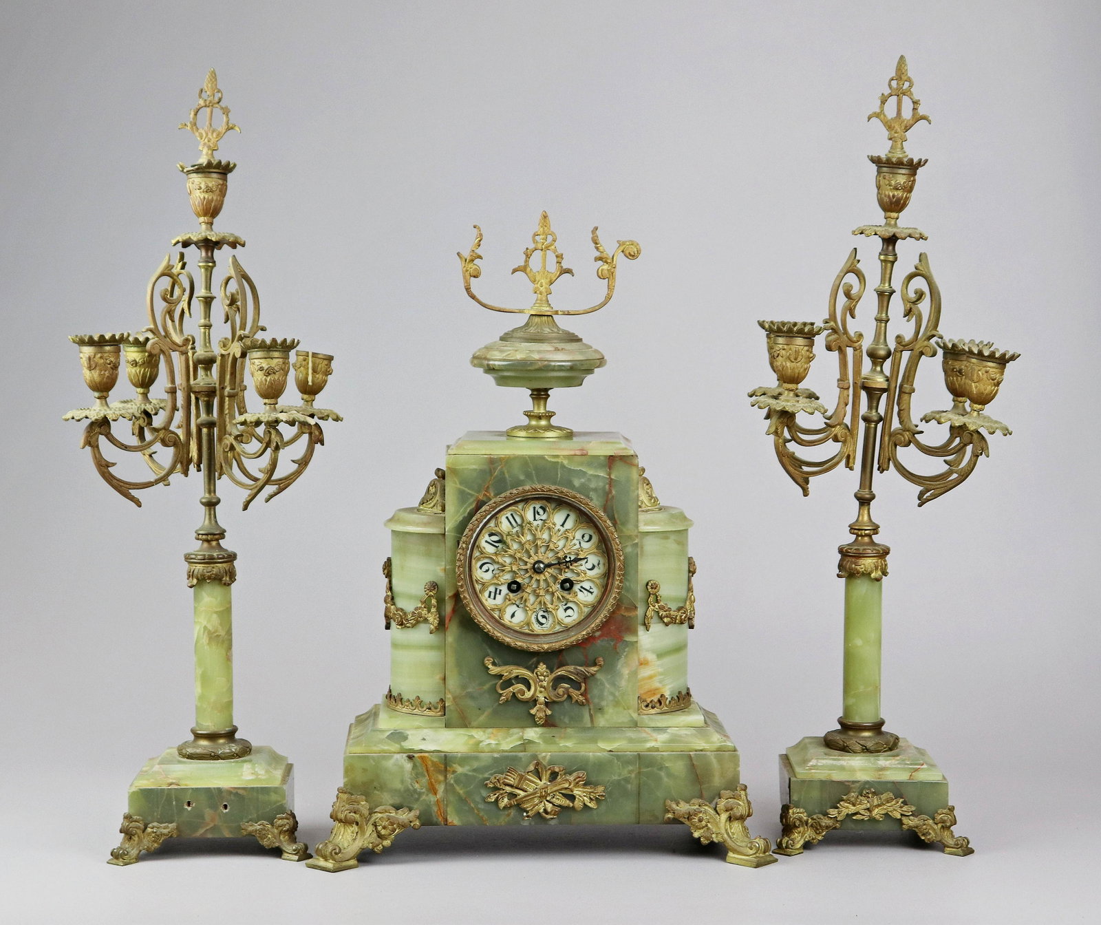 Green Alabaster 3-Pc French Clock Set: Green Alabaster 3 pc French clock Set W/Bronze Mounts, porcelain dial with filigree overlay marked â€œH. MUHR & SONS / PHILADELPHIA / FRANCE”, movement by Marti et Cie, clock 18” h, (2