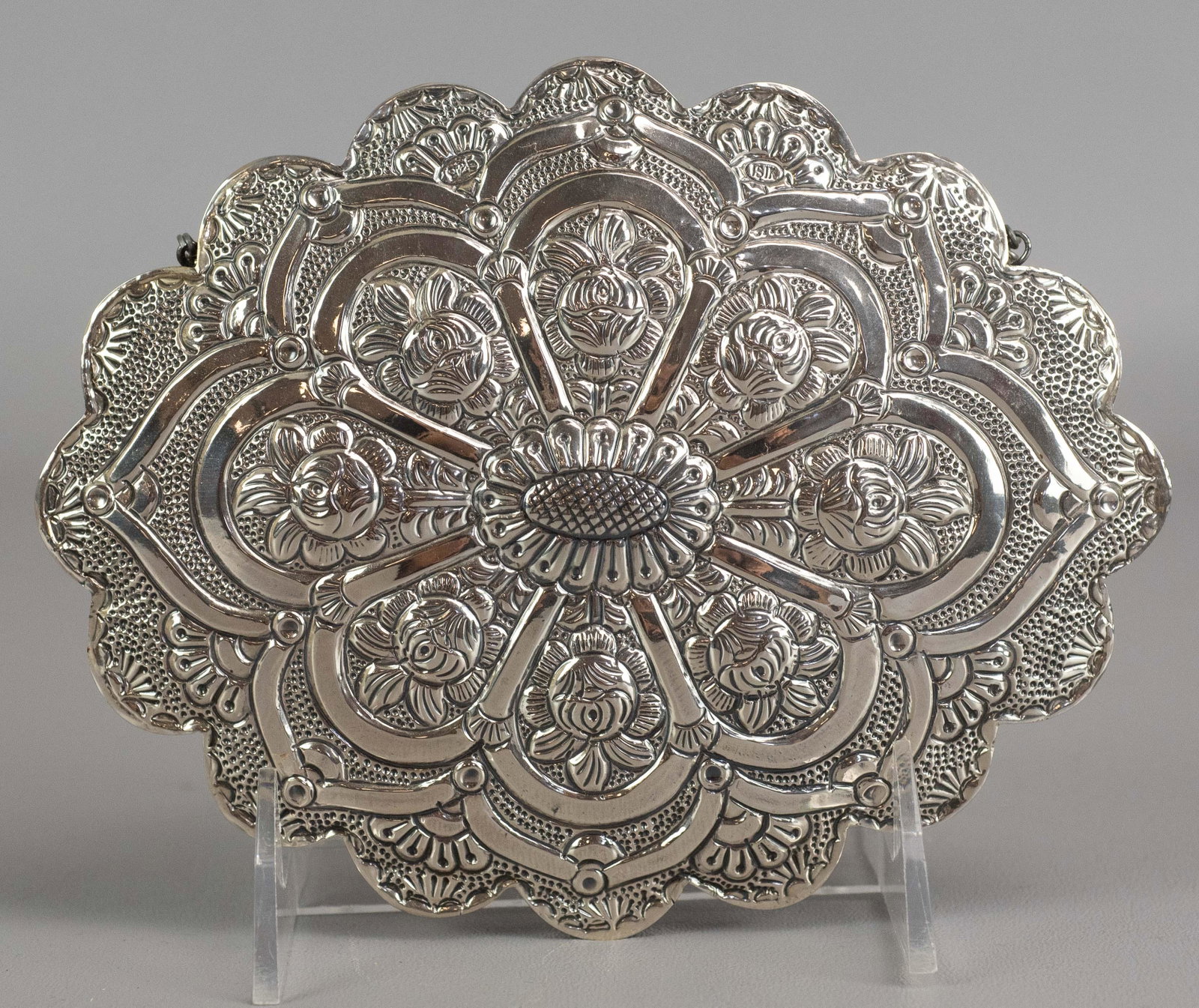 Sterling Turkish Wedding Wall Mirror: Sterling silver Turkish wedding wall mirror, embossed scalloped frame marked "925" & "ISIK", 6-1/2" x 5"