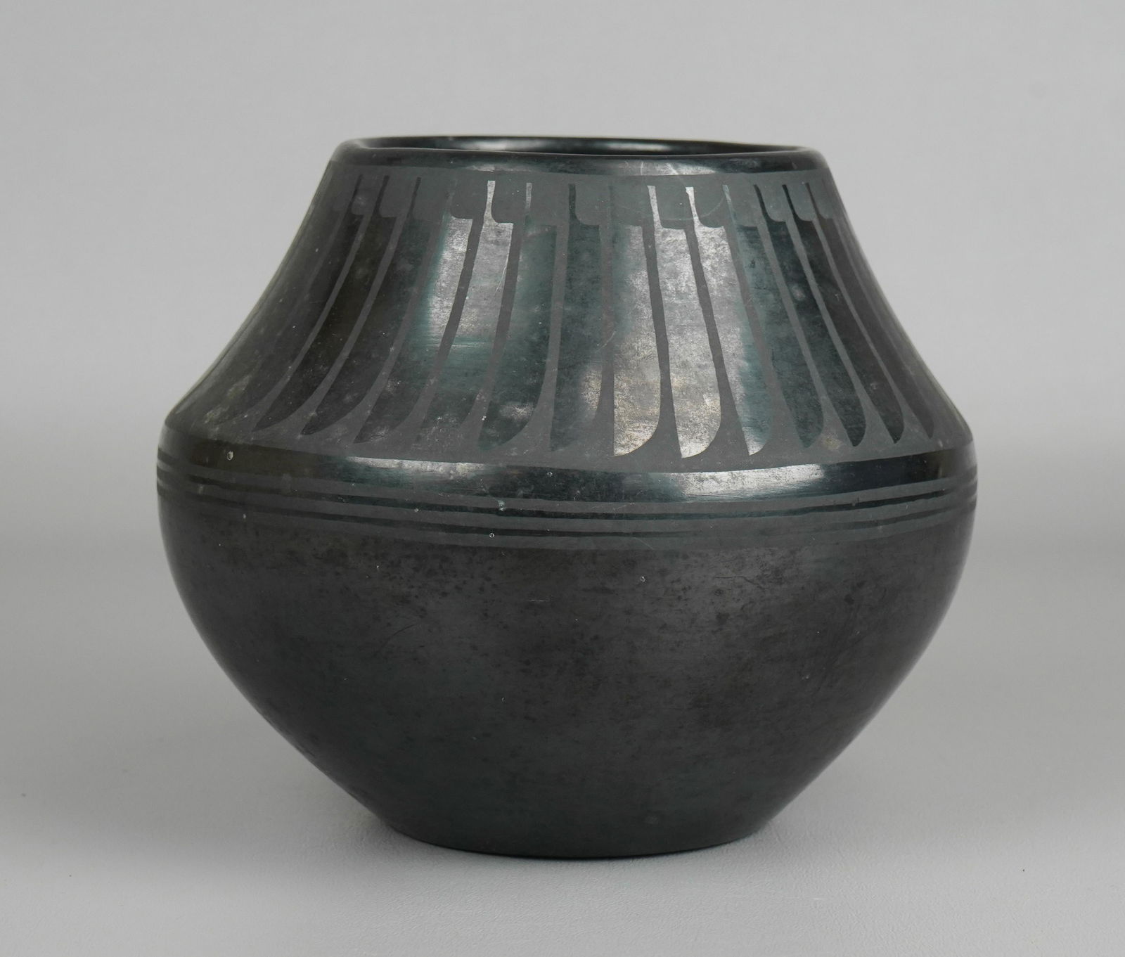 Maria Martinez Blackware Pottery Vase: Maria Martinez (San Ildefonso Pueblo, 1887-1980), blackware pottery vase, painted by her daughter-in-law Santana (1909-2002), signed Marie & Santana, 5-3/4" h c 7" dia