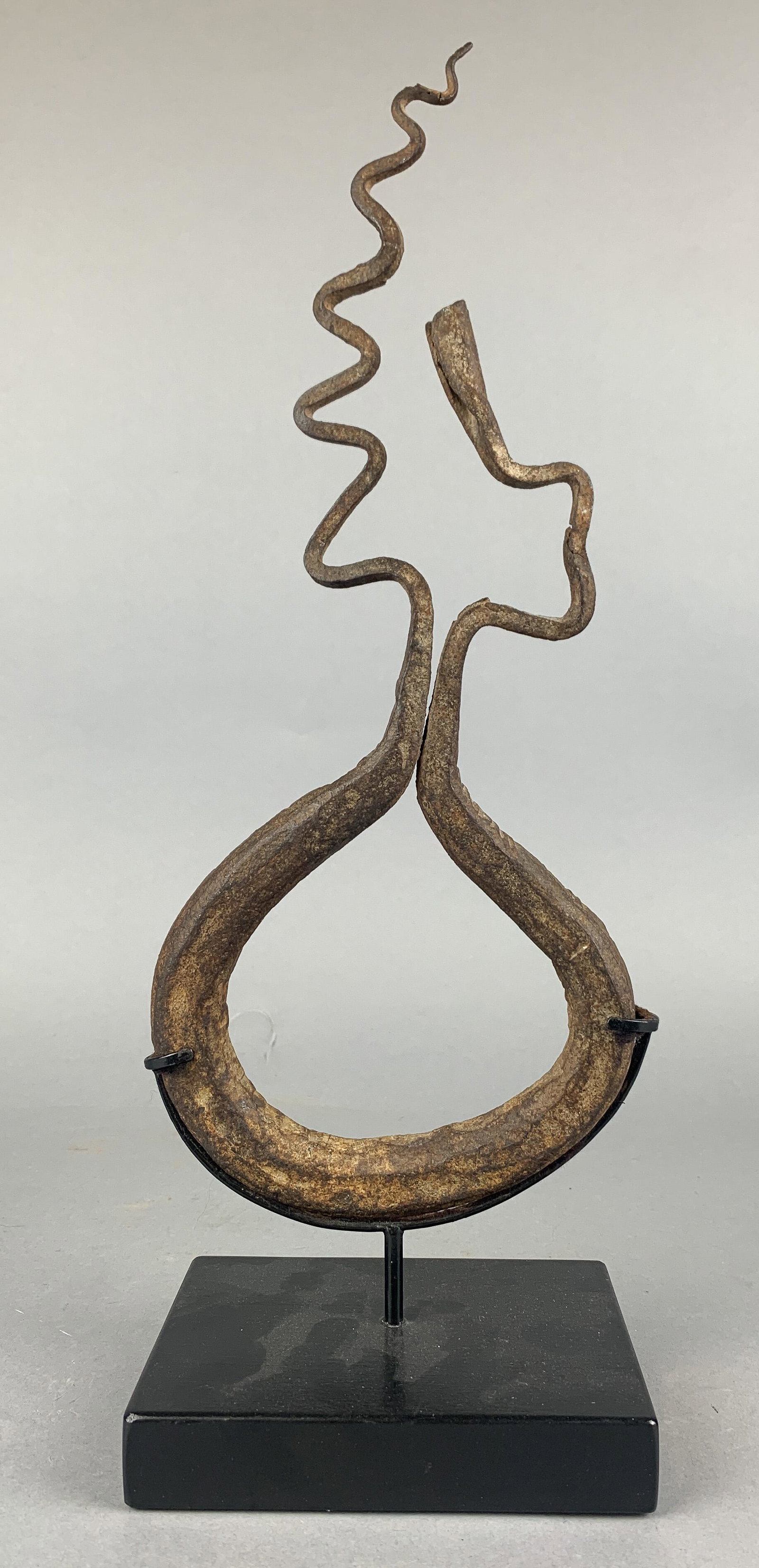 Northern Nigeria Manilla Currency: Northern Nigeria Manilla currency, iron abstract sculpture on stand, 17-1/4" h
