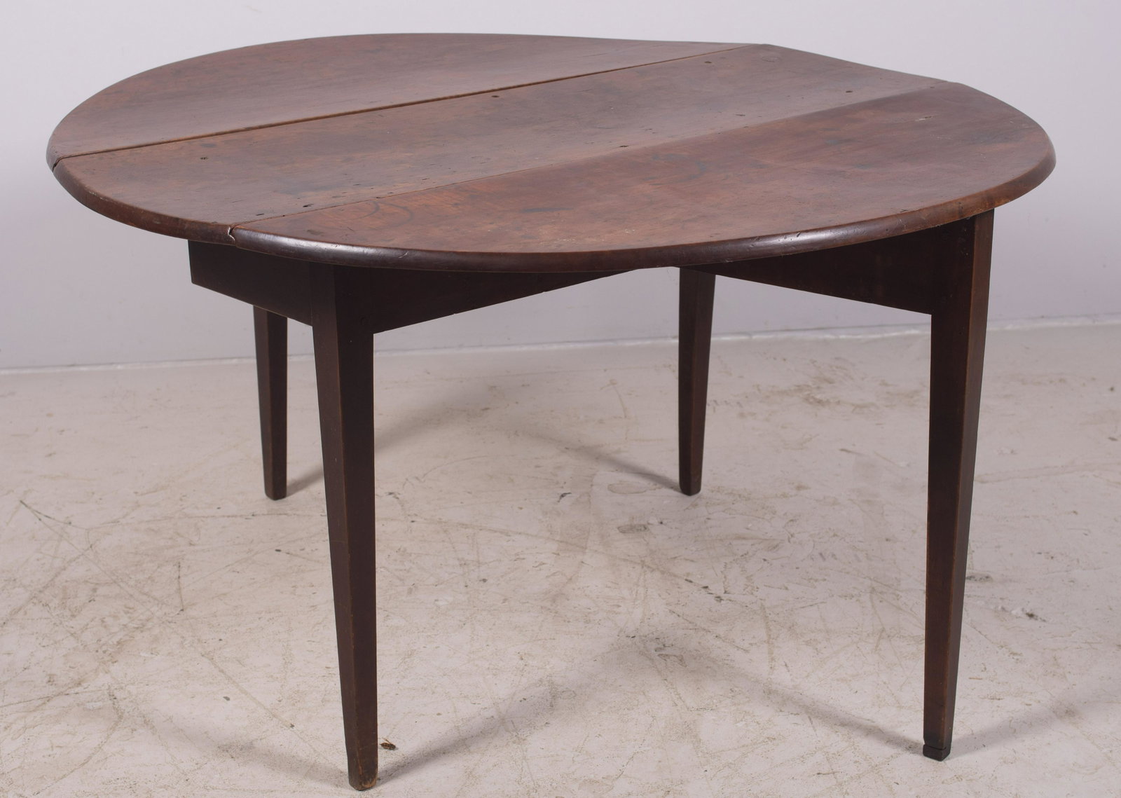 Cherry Hepplewhite Drop Leaf DR Table: Cherry Hepplewhite Drop Leaf DR Table w/Rounded Leaves, pleasing old surface/finish, 48" l, 14" w, 17" leaves, 48" round with leaves up, 6 1/2" overhang at ends, c 1800