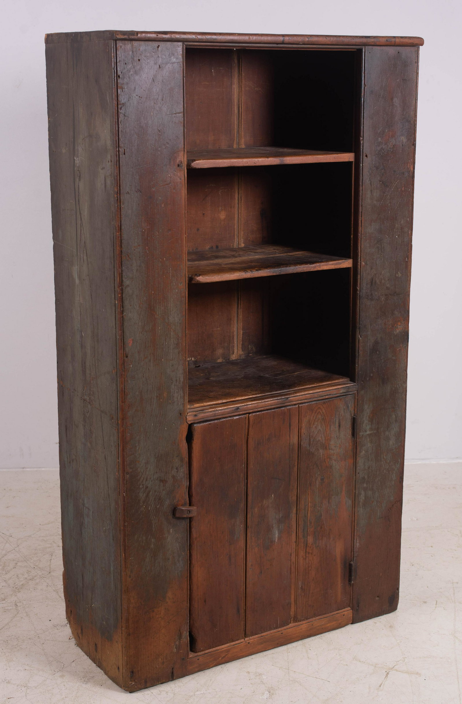 Pine Open Top Wall Cupboard: Pine Open Top Wall Cupboard, old blue painted/scrubbed finish, missing the top door, 3 board plank and batten bottom door, 18th c, 69" h, 37 1/4" w, 17" d