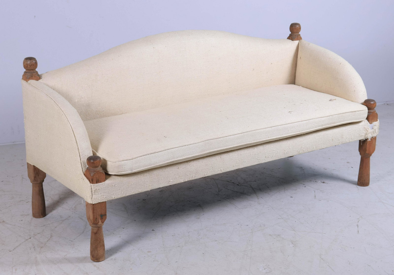 Primitive style upholstered settee: Primitive style upholstered settee, cream upholstery, 31" h x 60-1/2" w, some soiling to upholstery
