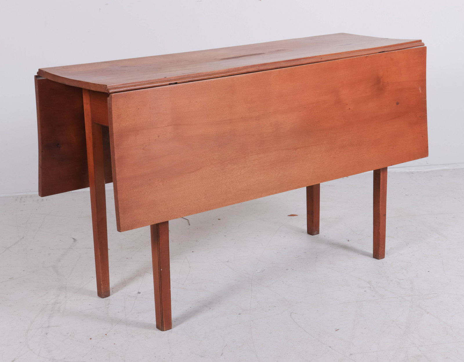 Pine Hepplewhite style drop leaf table: Pine Hepplewhite style drop leaf table, stains and wear to top, 26-1/2" h x 45" w, two 14'w drop leaves