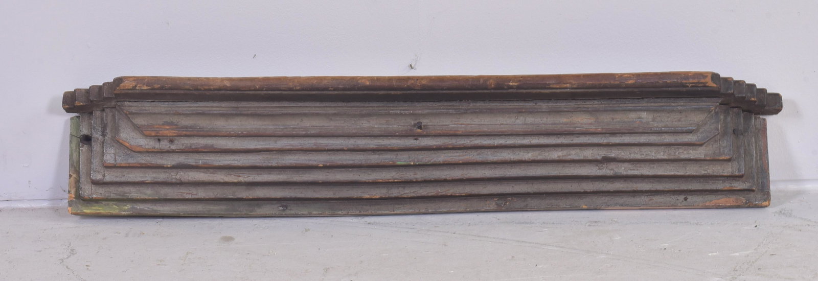 Ascending hanging wall shelf: Ascending hanging wall shelf, green painted, wear to paint, 37" h x 5" w