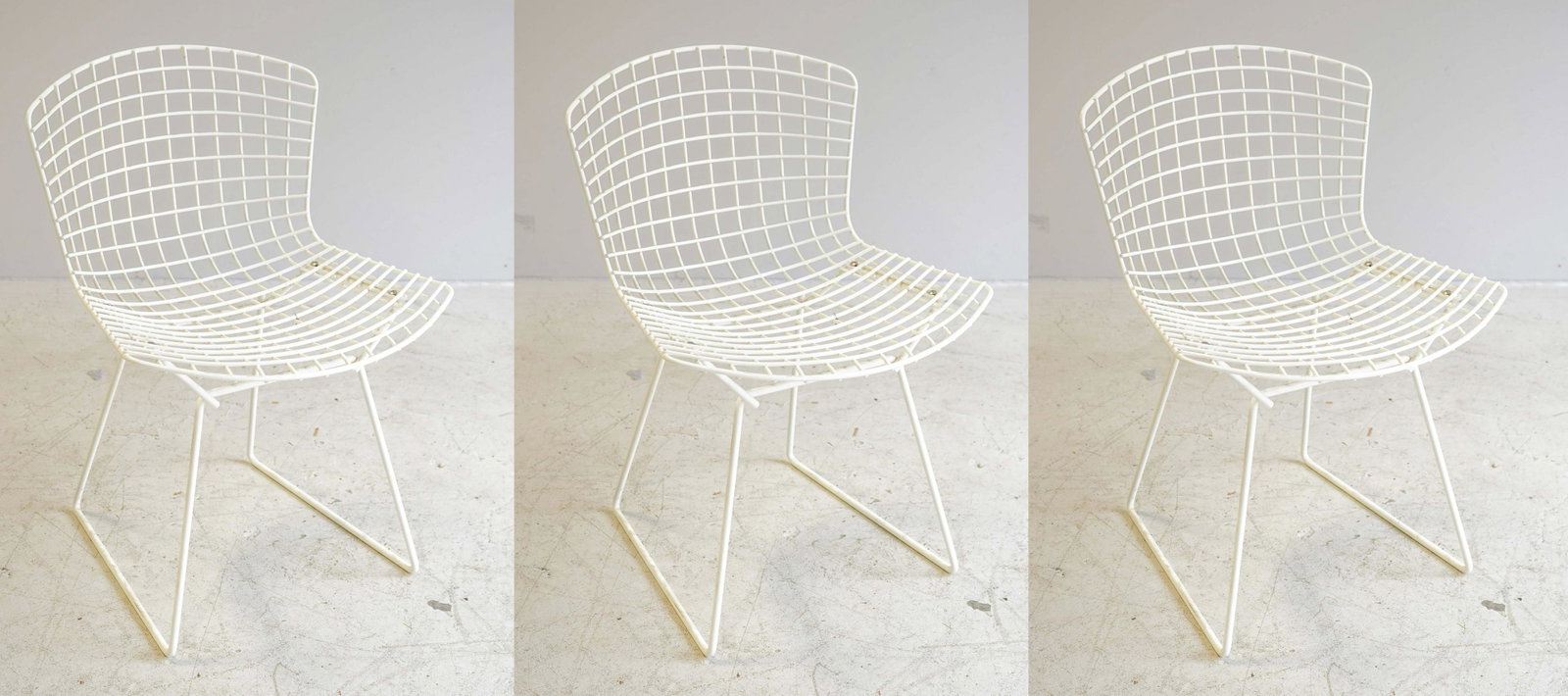 (3) Bertoia wire basket chairs: (3) Bertoia wire basket chairs, white wire framed seat, 25-1/2" h