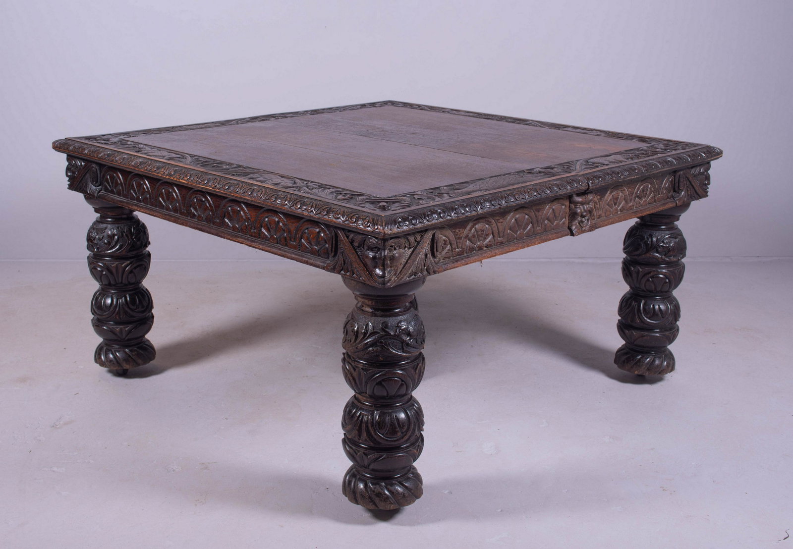 (9) pc Carved Oak Victorian DRS: (9) pc Carved Oak Victorian DRS, c/o square table with carved band around top depicting fish, boars, and lion masks, the carved apron with lion lead corners, on bulbous turned and carved legs, (3) 21-