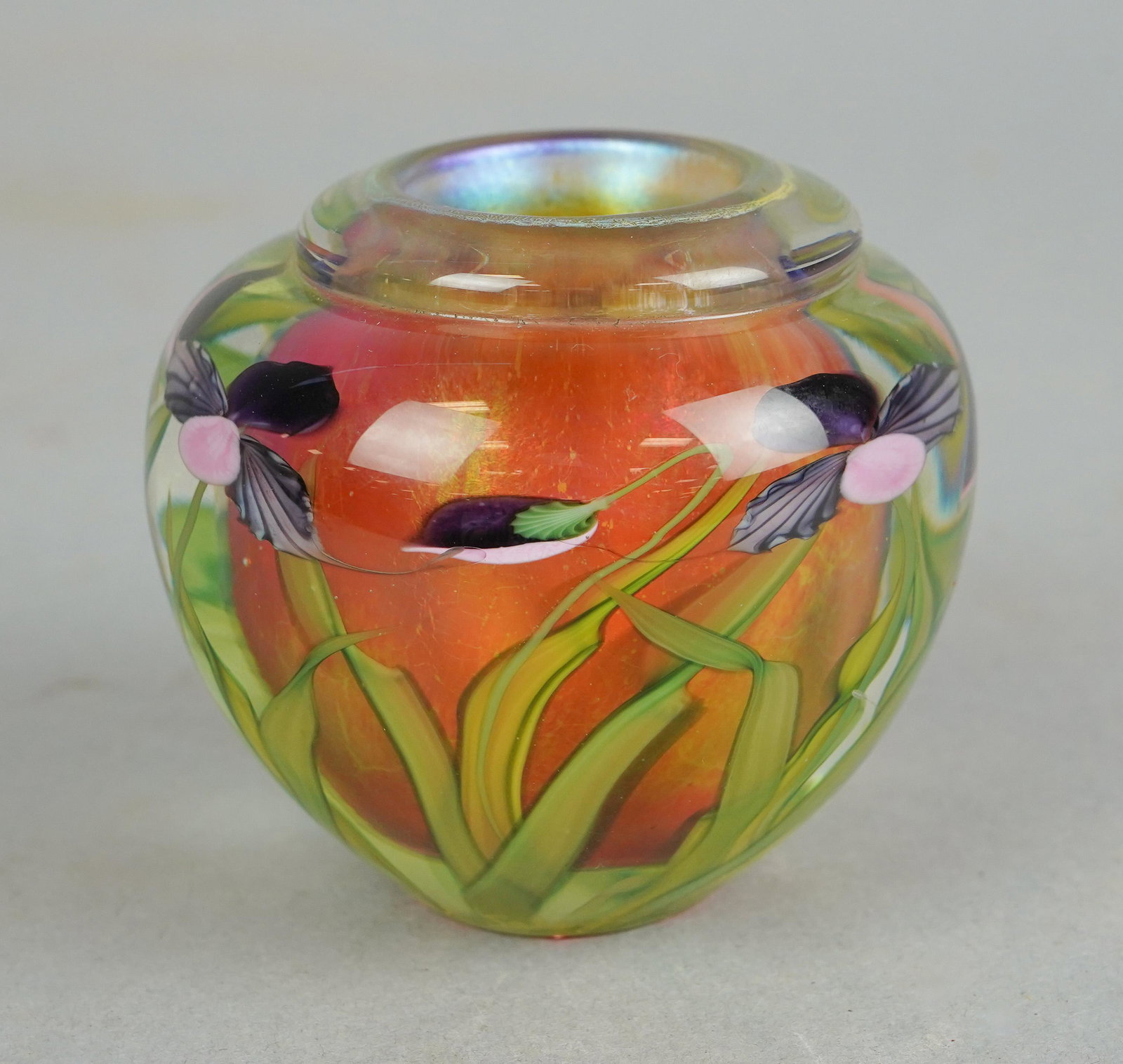 Lundberg Studios Daniel Salazar Paperweight Vase: Lundberg Studios Daniel Salazar paperweight vase, gold iridescent and iris design, signed at underside, 2-3/4" H x 3" W