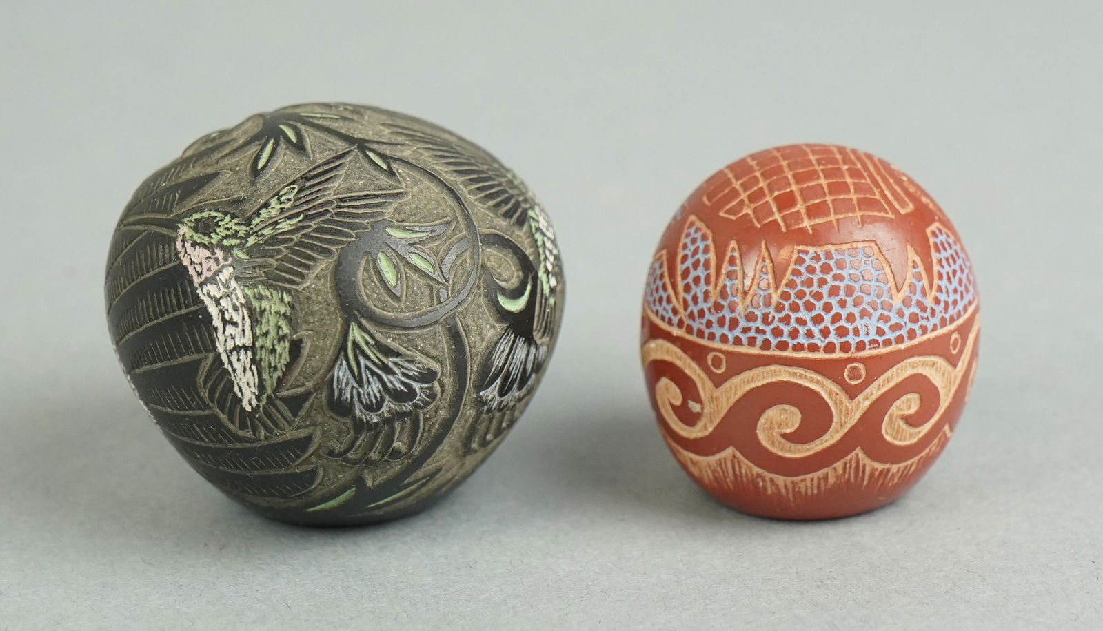 (2) Rosemary Apple Blossom Lonewolf Pottery Miniatures: (2) Rosemary Apple Blossom Lonewolf pottery miniatures to include etched redware miniature in fish and wave design, 1-1/4" H, signed at underside 'Apple Blossom BNCBM' and black etched miniature in hu