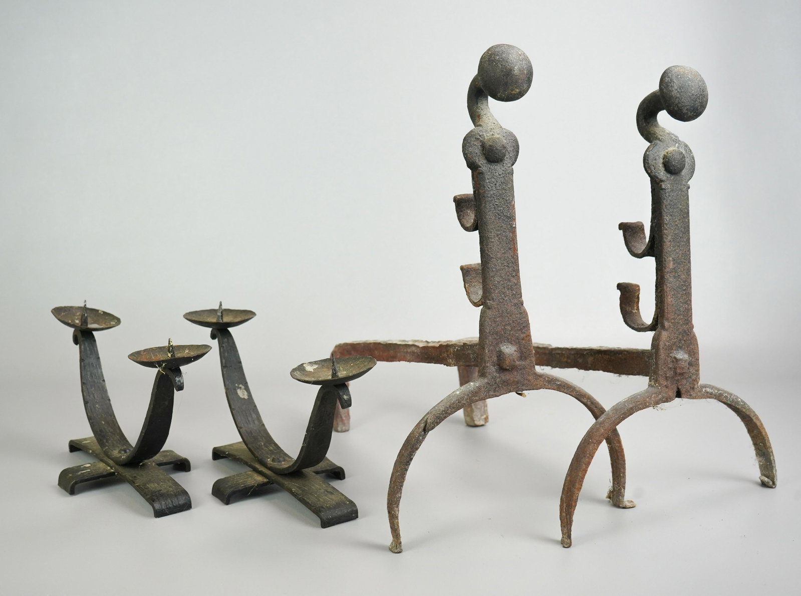 Forged Andirons and Candle Spikes: Forged andirons and candle spikes to include early forged andirons and 2-light arc raised candle spikes.