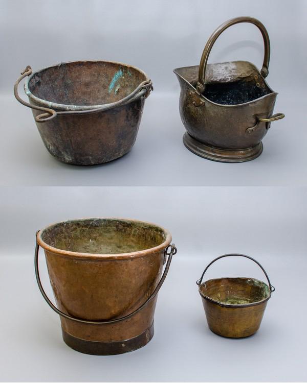 (4) Copper and Brass Vessels: (4) Copper and brass vessels to include hammered copper rolled rim bucket with swing handle and banded base, 12" D 10-1/2" H, copper rolled rim apple butter kettle with twist top swing handle, 14" dia